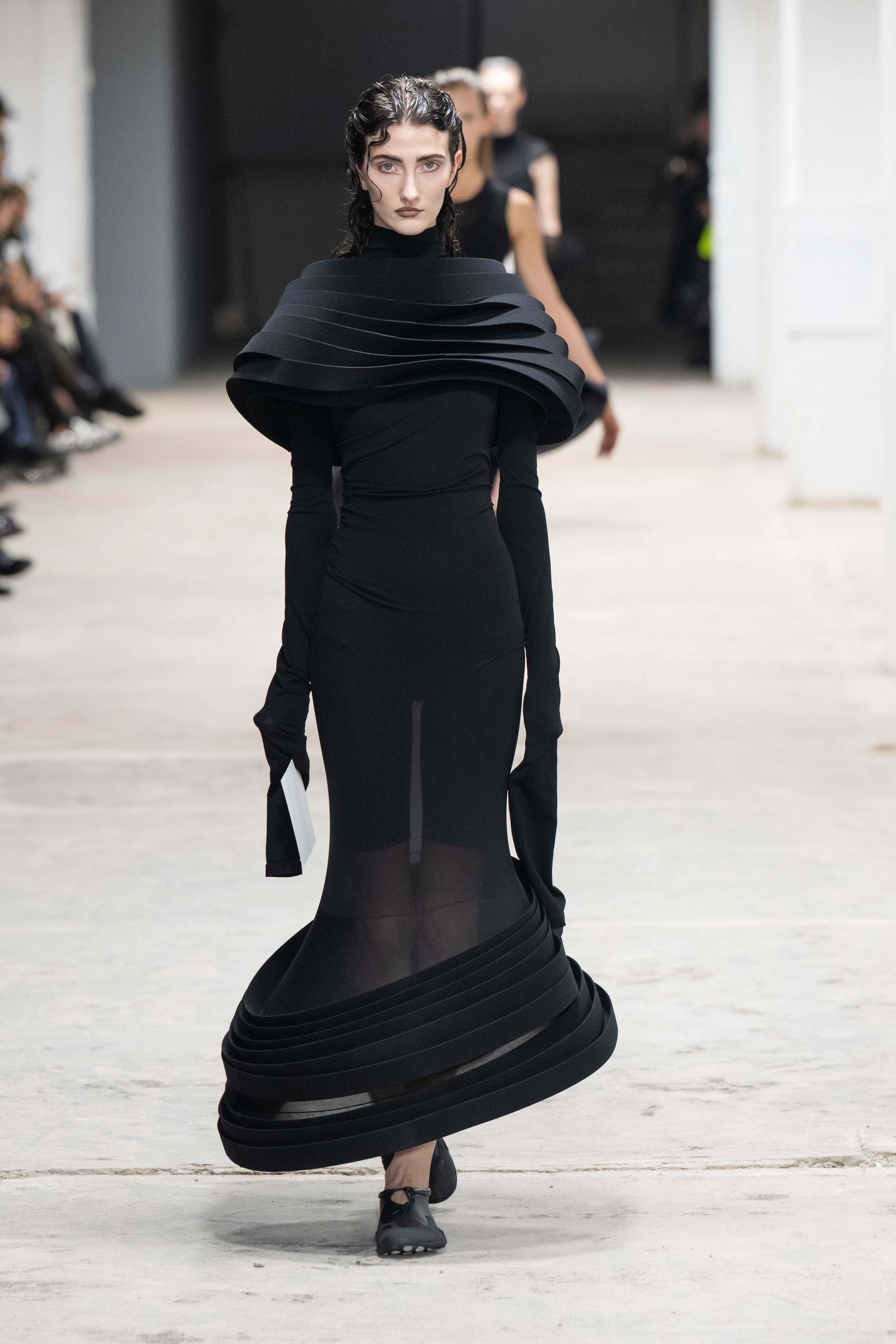 Fashion model wearing a Junya Watanabe SS26 outfit