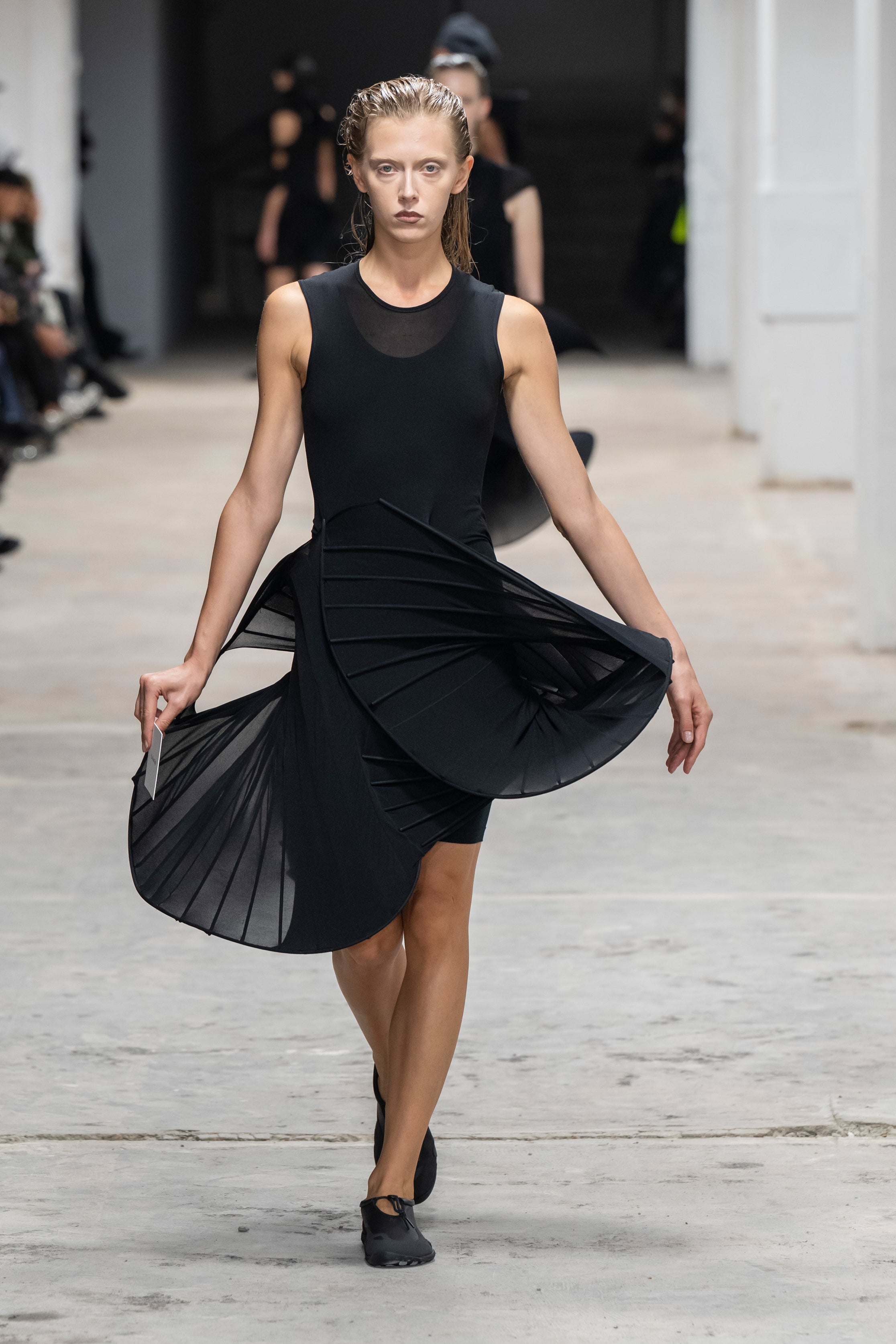 Fashion model wearing a Junya Watanabe SS26 outfit