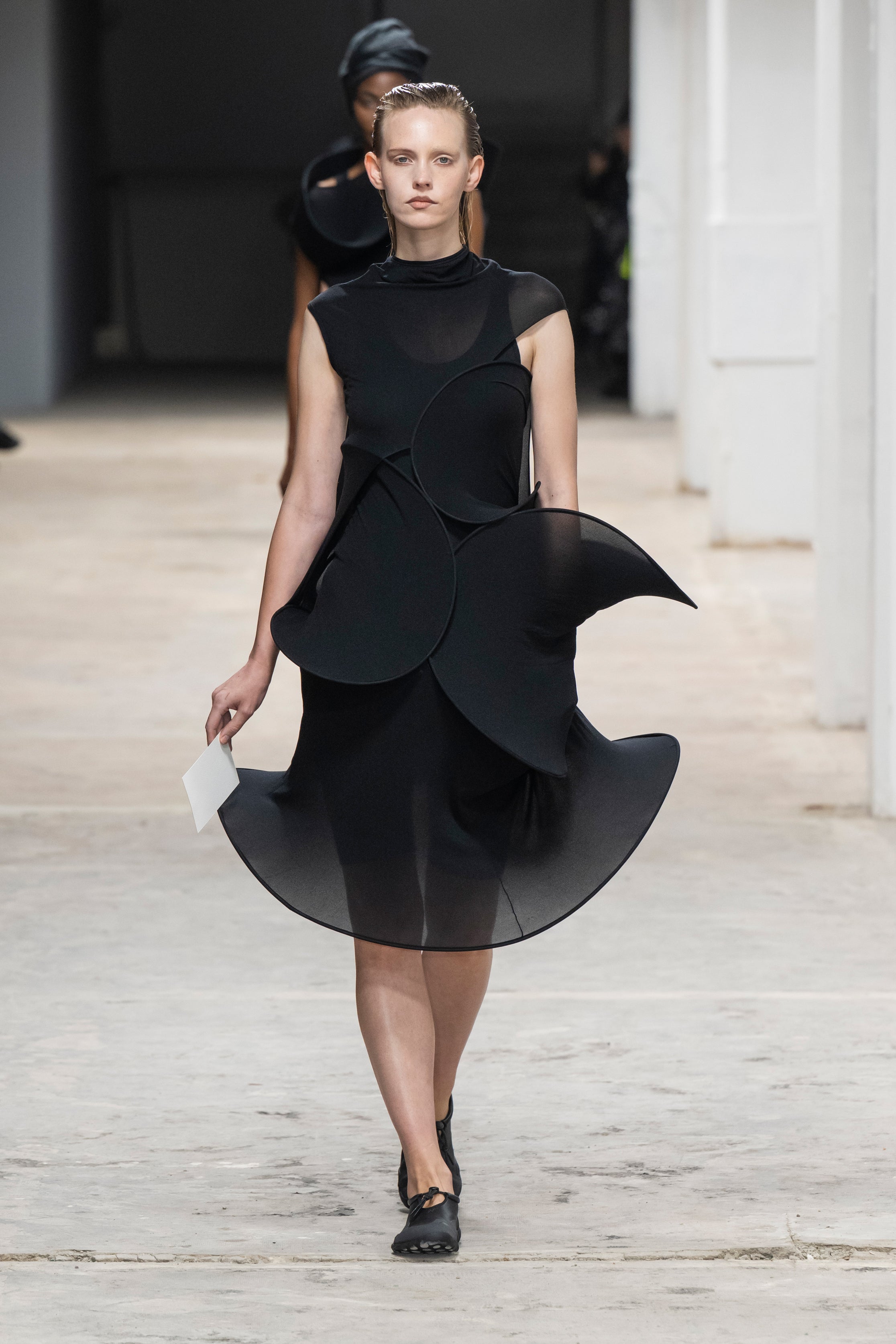 Fashion model wearing a Junya Watanabe SS26 outfit