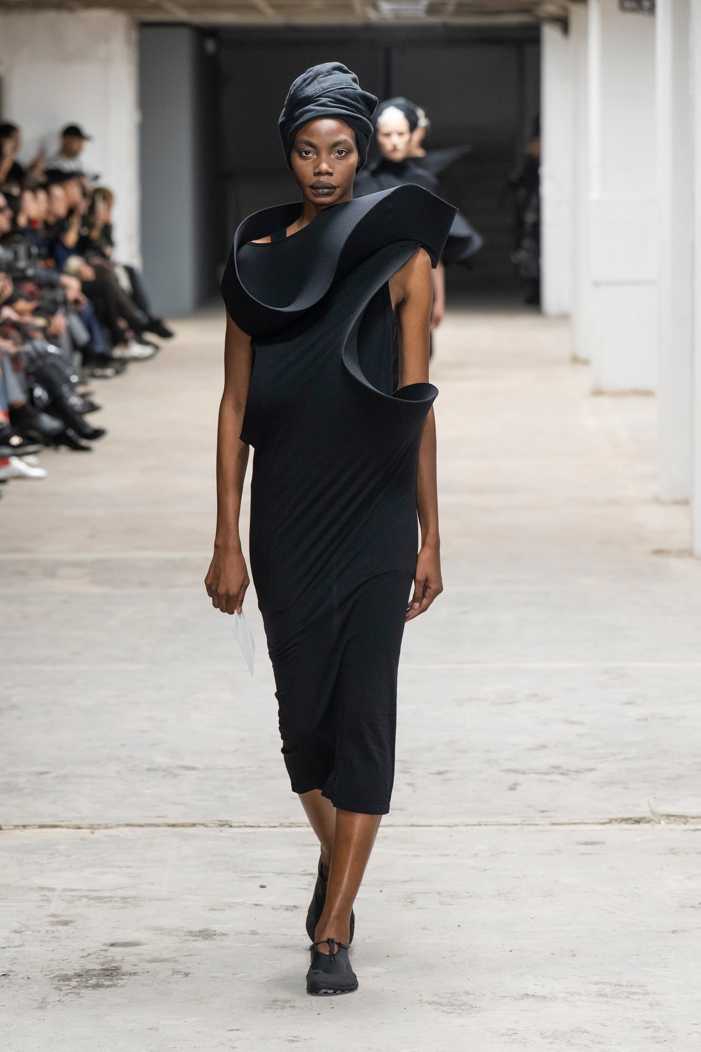 Fashion model wearing a Junya Watanabe SS26 outfit