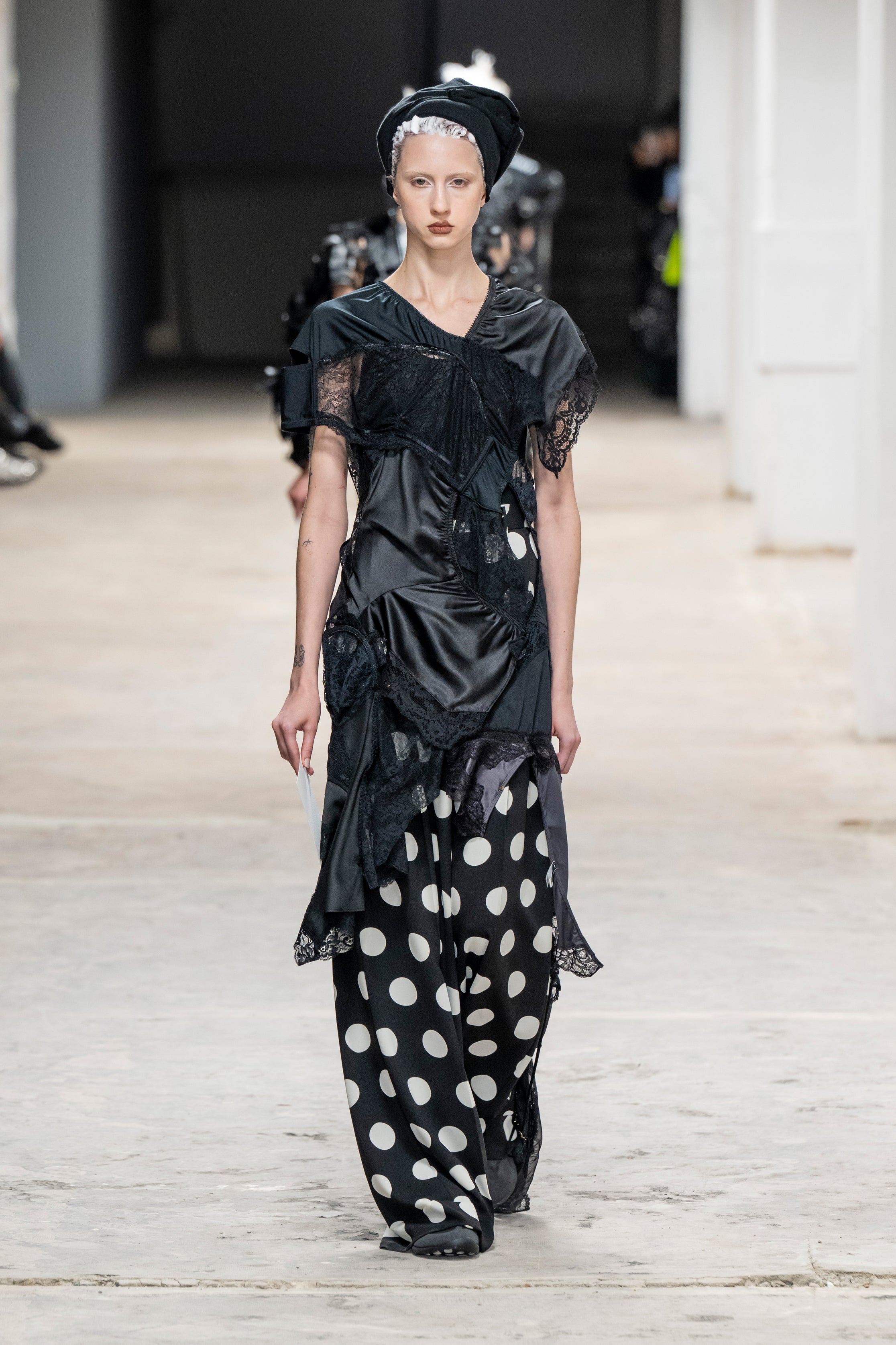 Fashion model wearing a Junya Watanabe SS26 outfit