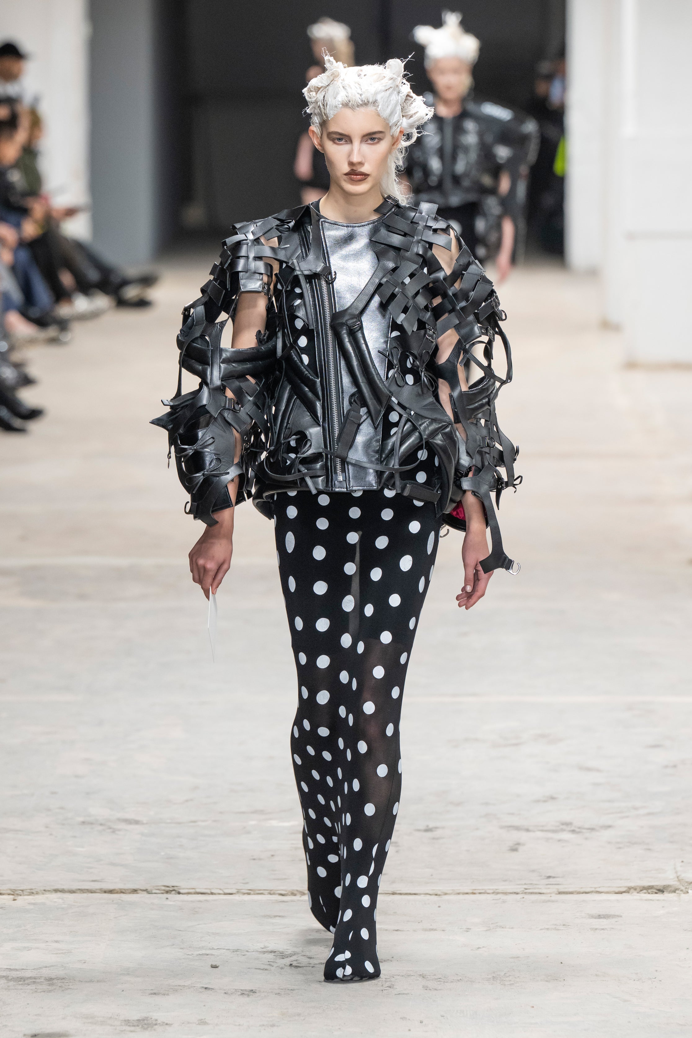 Fashion model wearing a Junya Watanabe SS26 outfit