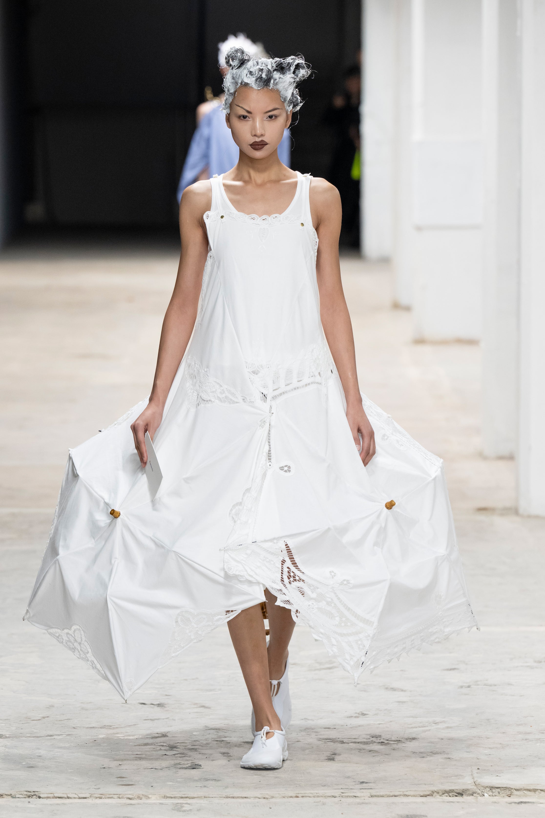 Fashion model wearing a Junya Watanabe SS26 outfit