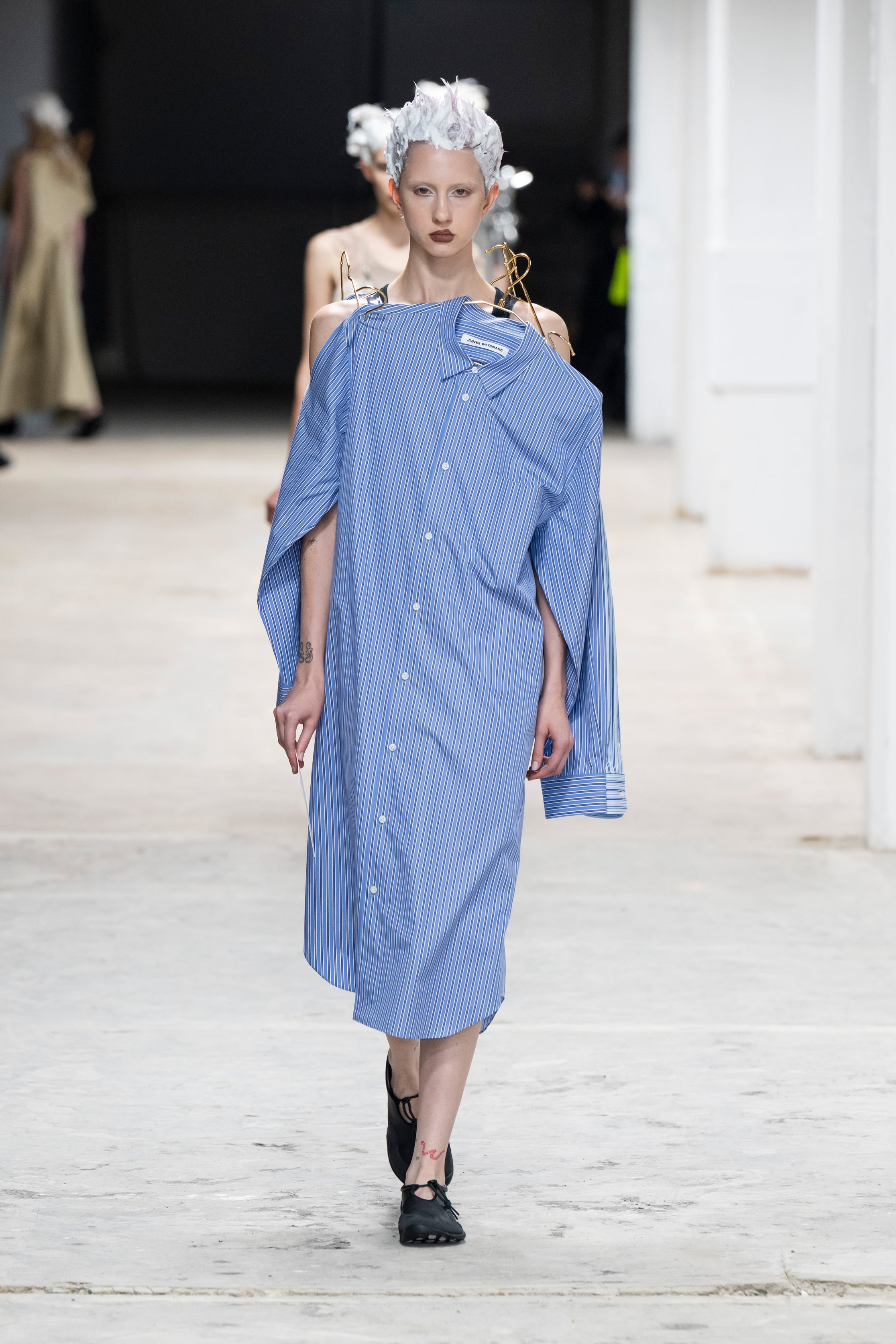 Fashion model wearing a Junya Watanabe SS26 outfit