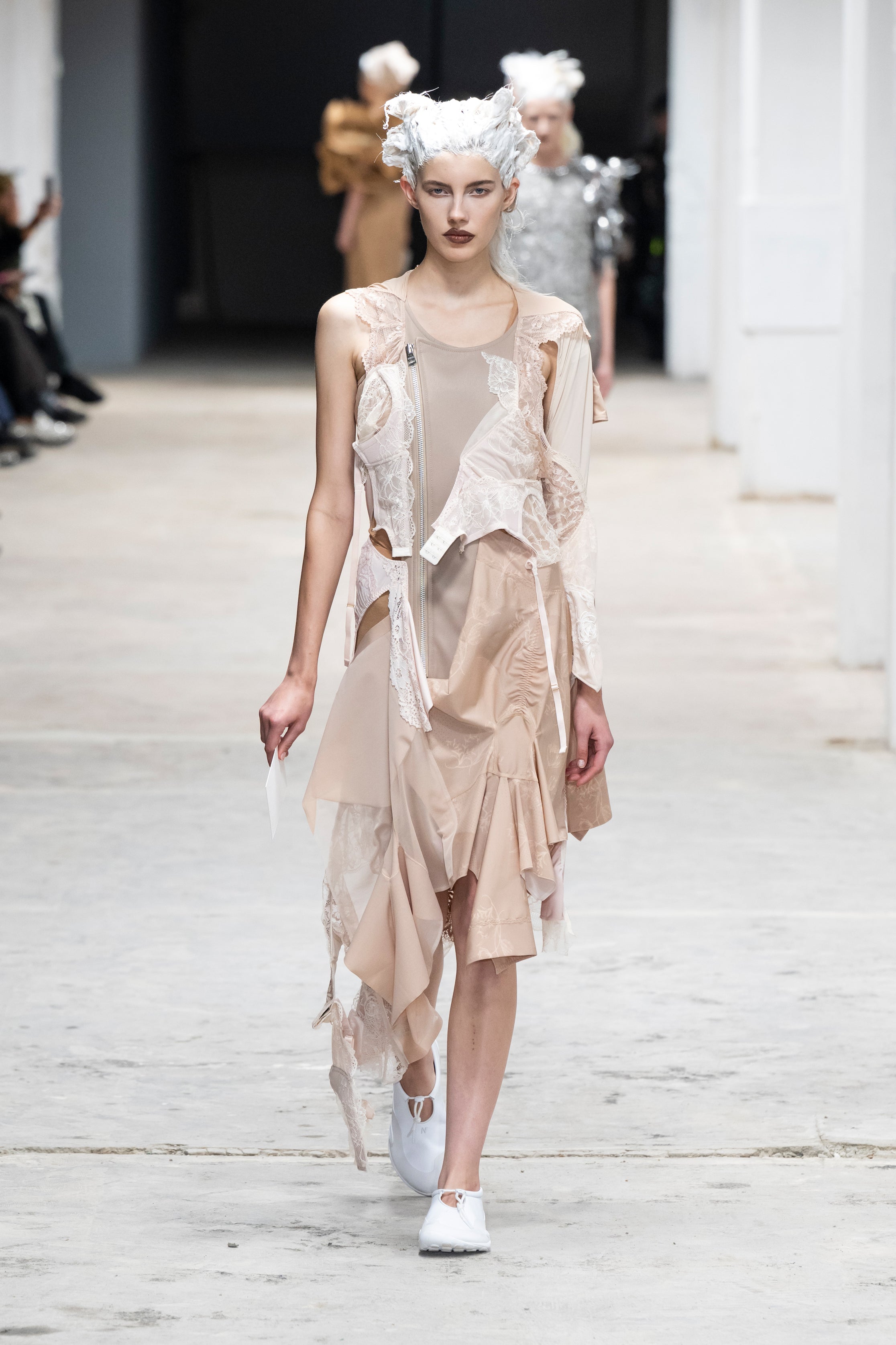 Fashion model wearing a Junya Watanabe SS26 outfit