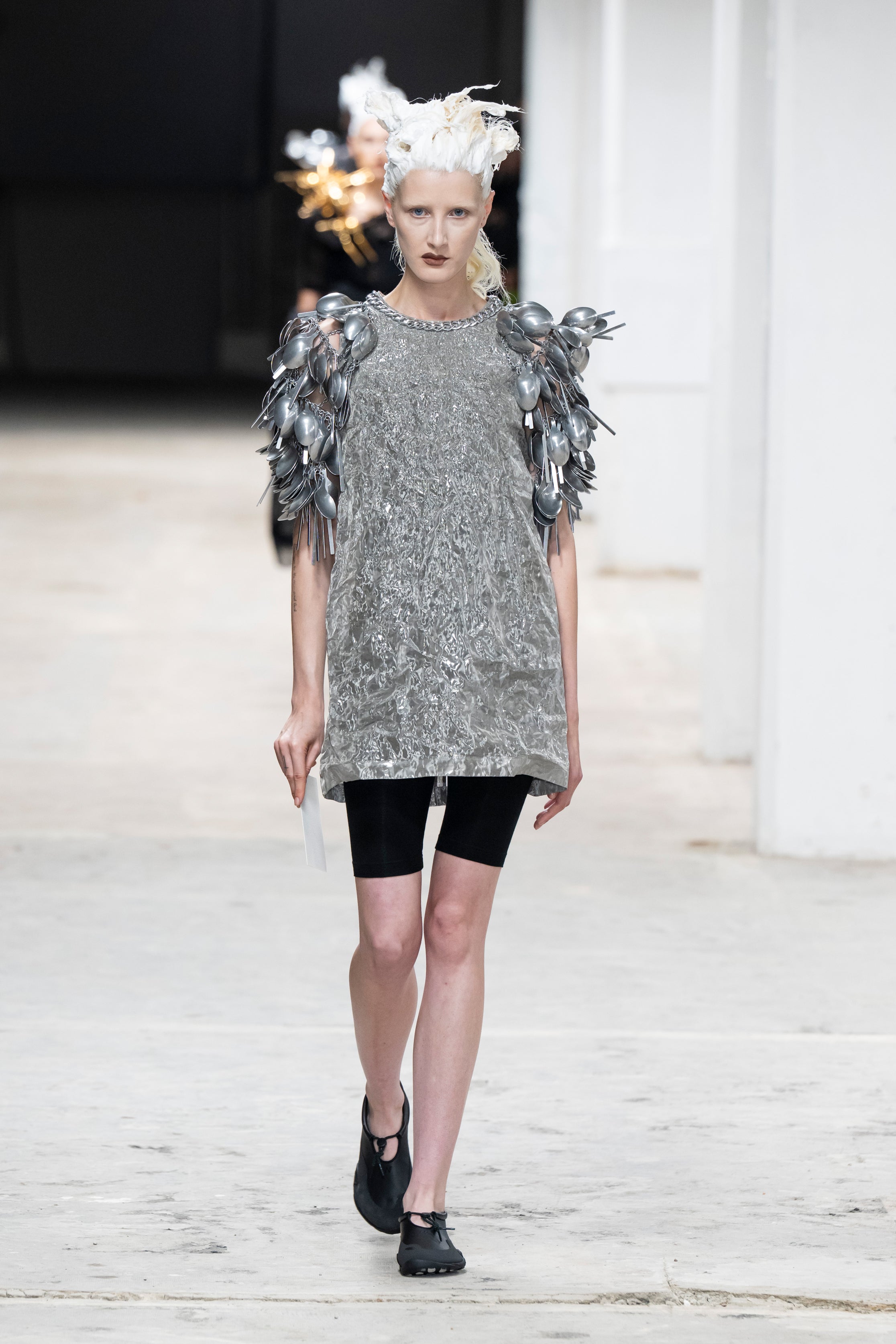 Fashion model wearing a Junya Watanabe SS26 outfit