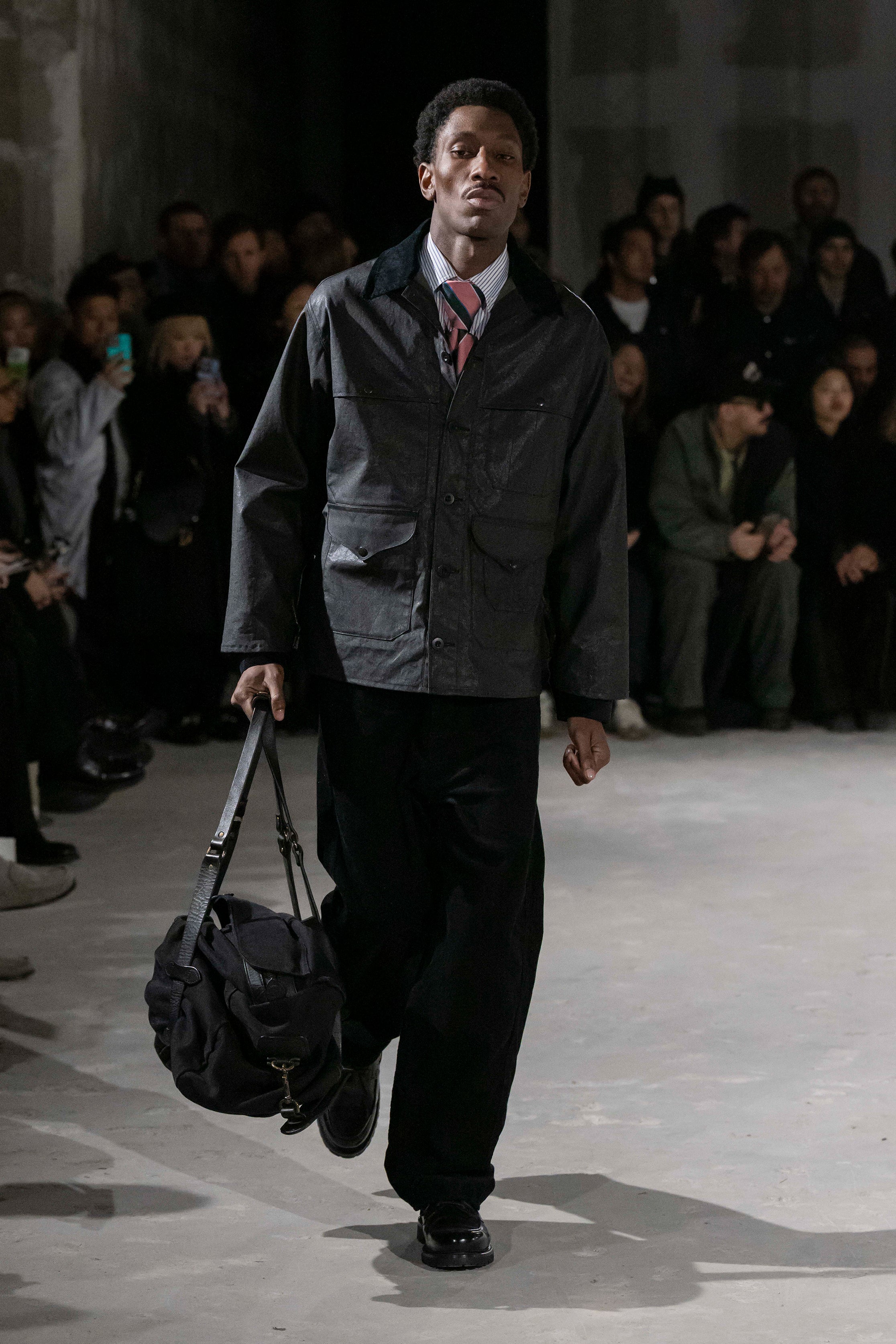 Fashion model wearing a Junya Watanabe Man AW25 outfit