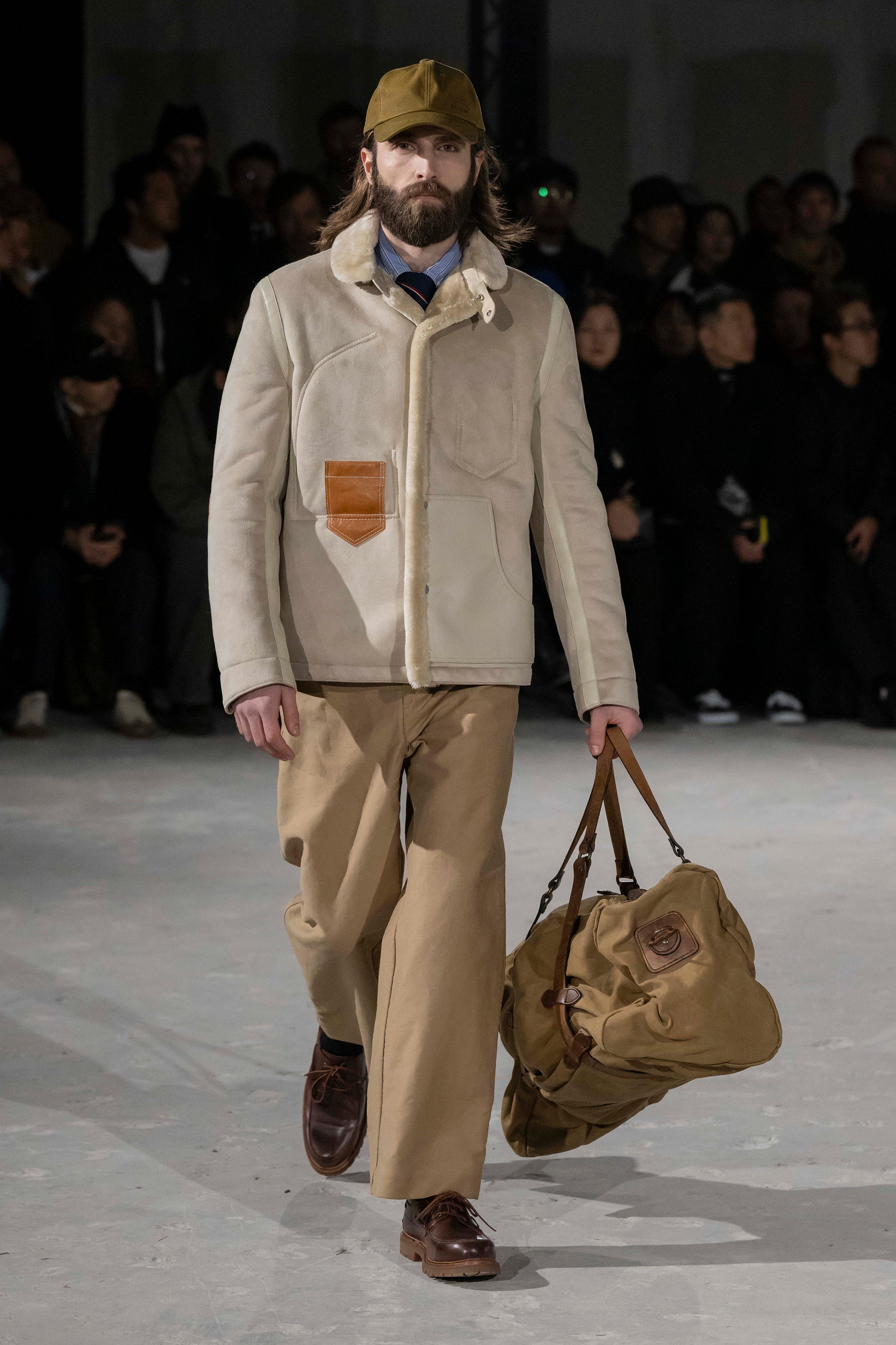 Fashion model wearing a Junya Watanabe Man AW25 outfit
