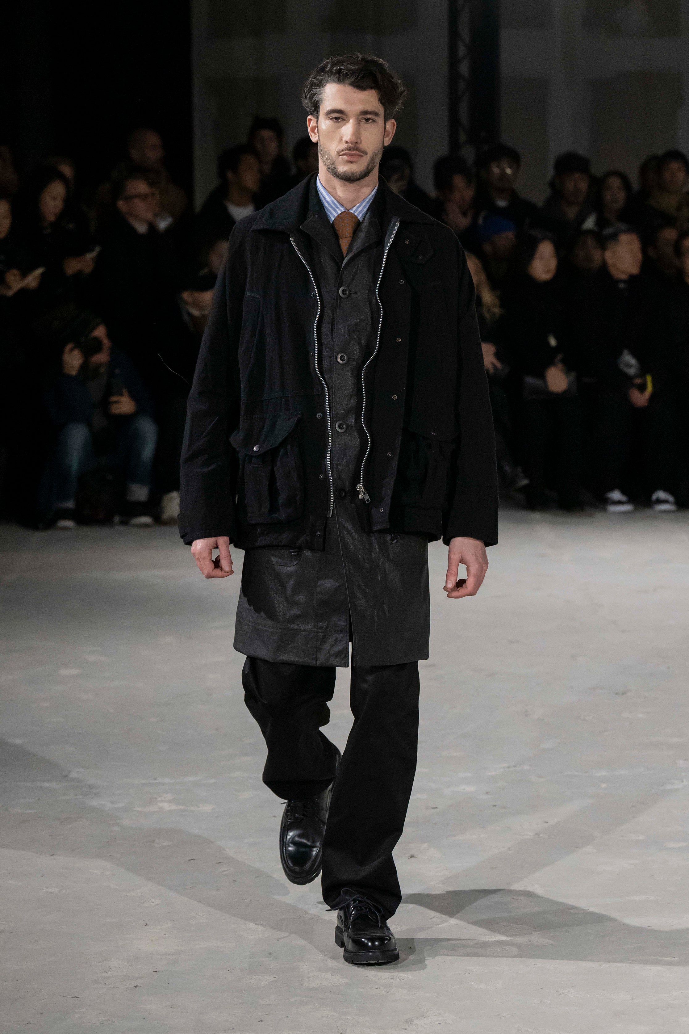 Fashion model wearing a Junya Watanabe Man AW25 outfit