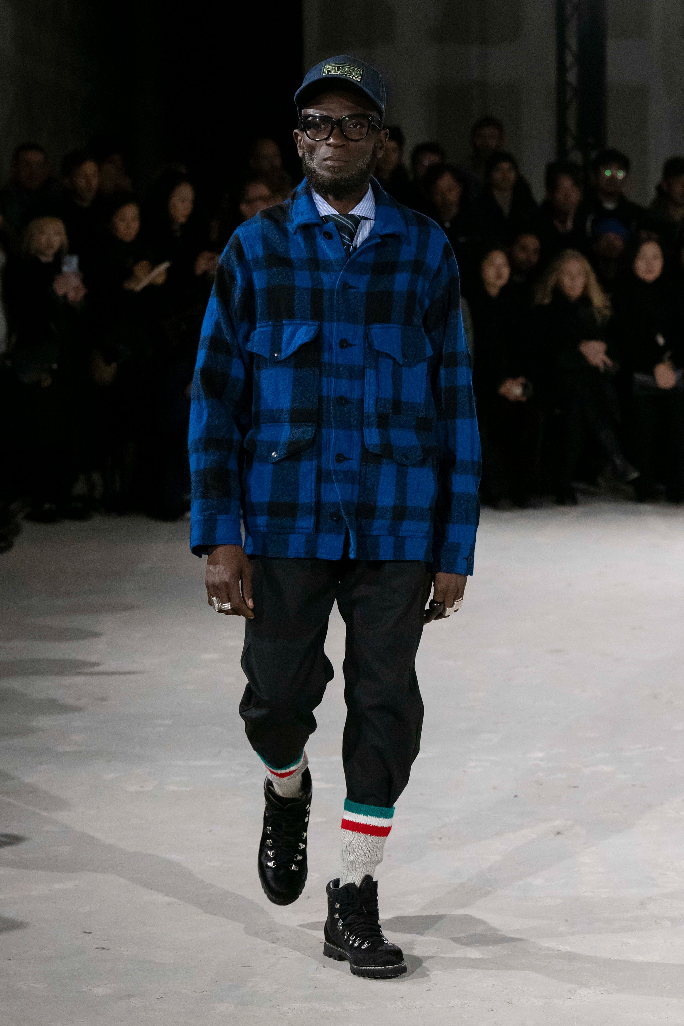 Fashion model wearing a Junya Watanabe Man AW25 outfit