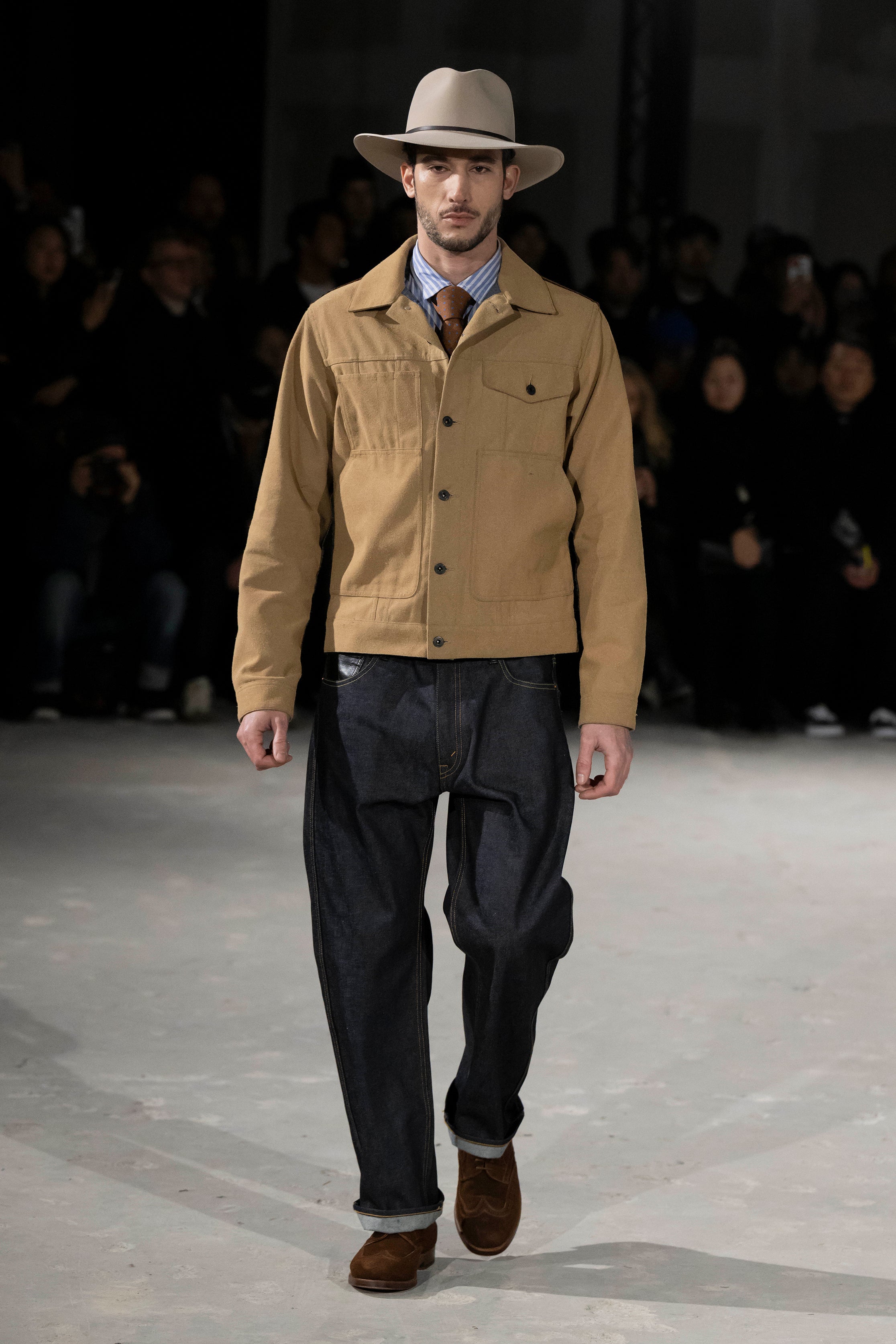 Fashion model wearing a Junya Watanabe Man AW25 outfit