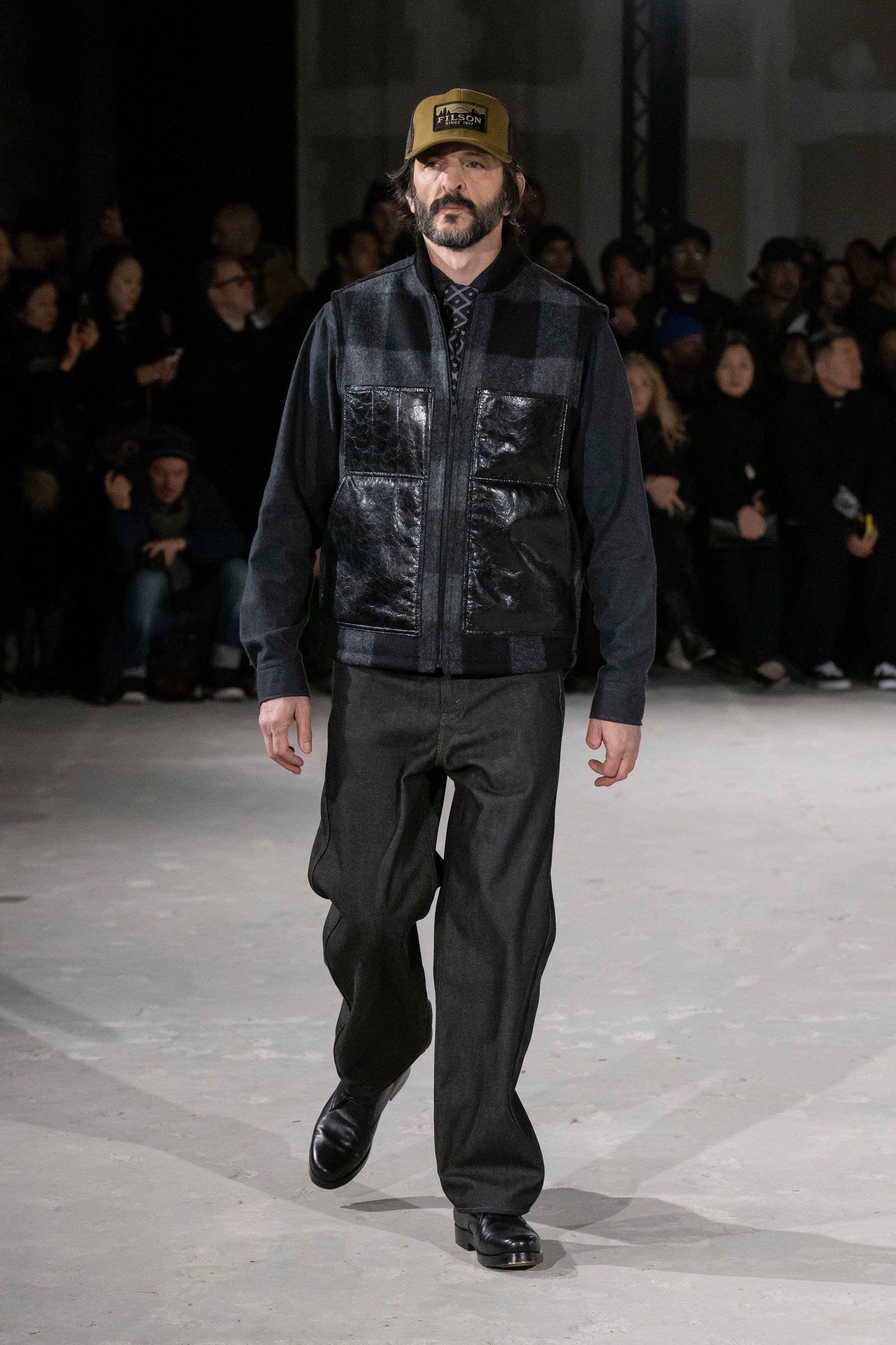 Fashion model wearing a Junya Watanabe Man AW25 outfit