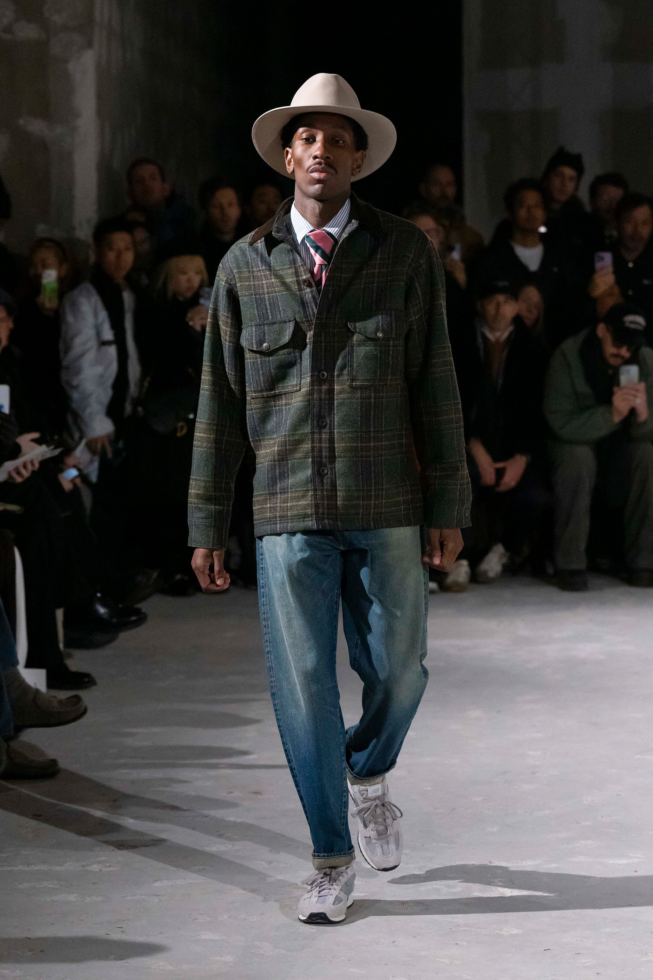 Fashion model wearing a Junya Watanabe Man AW25 outfit