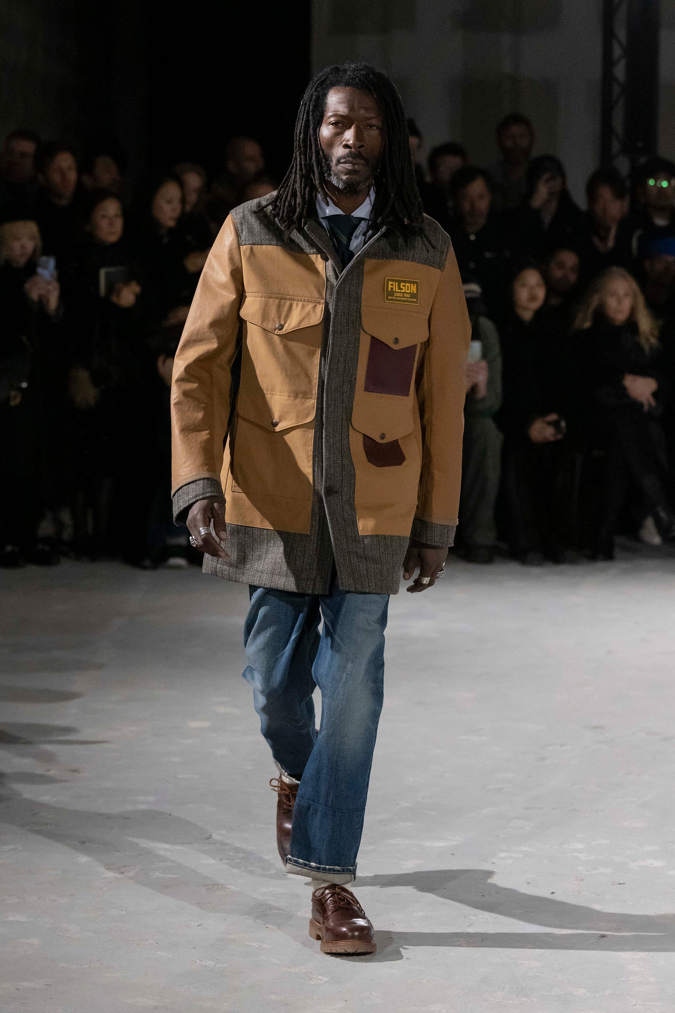 Fashion model wearing a Junya Watanabe Man AW25 outfit