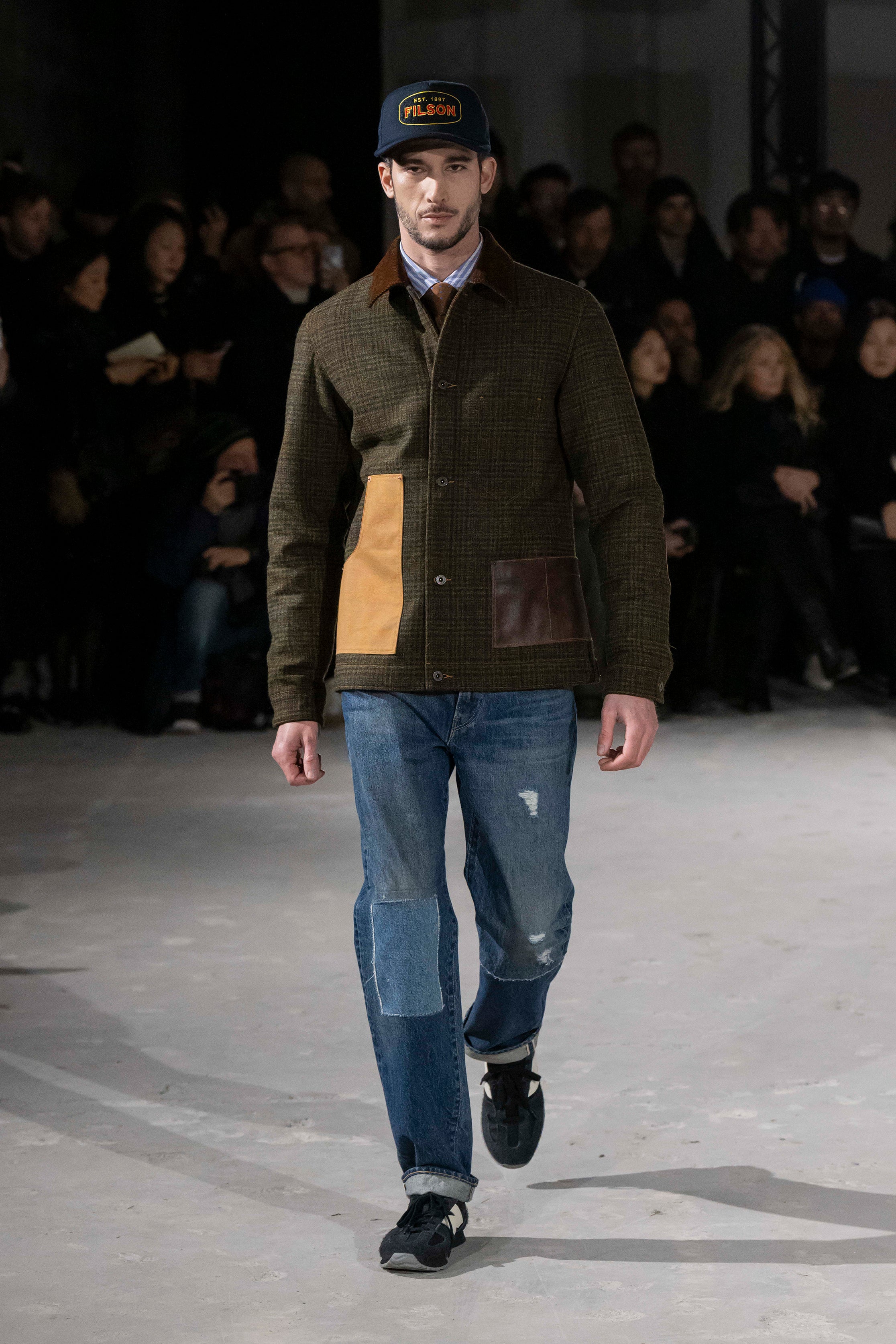 Fashion model wearing a Junya Watanabe Man AW25 outfit