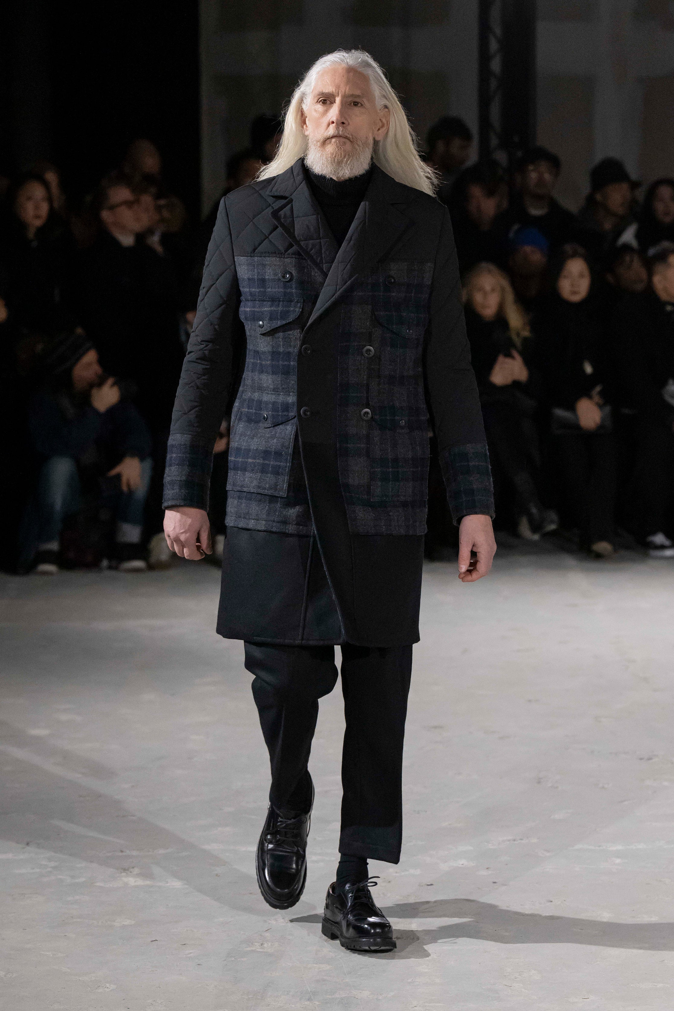 Fashion model wearing a Junya Watanabe Man AW25 outfit