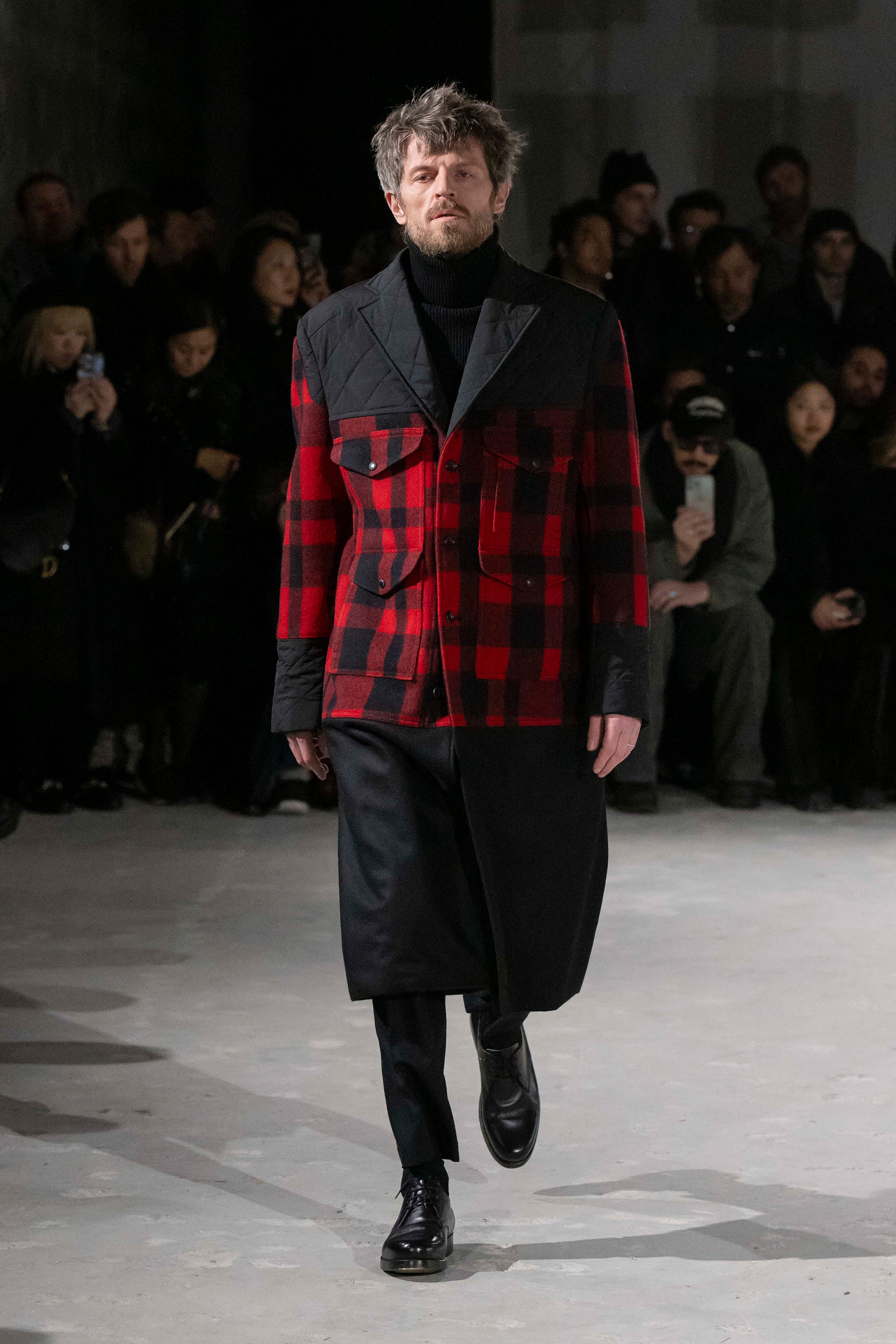 Fashion model wearing a Junya Watanabe Man AW25 outfit