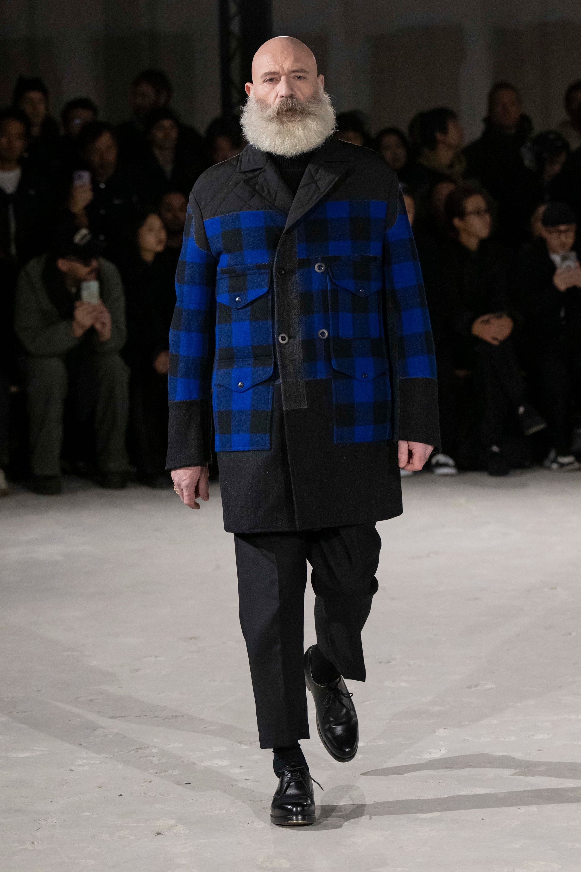 Fashion model wearing a Junya Watanabe Man AW25 outfit