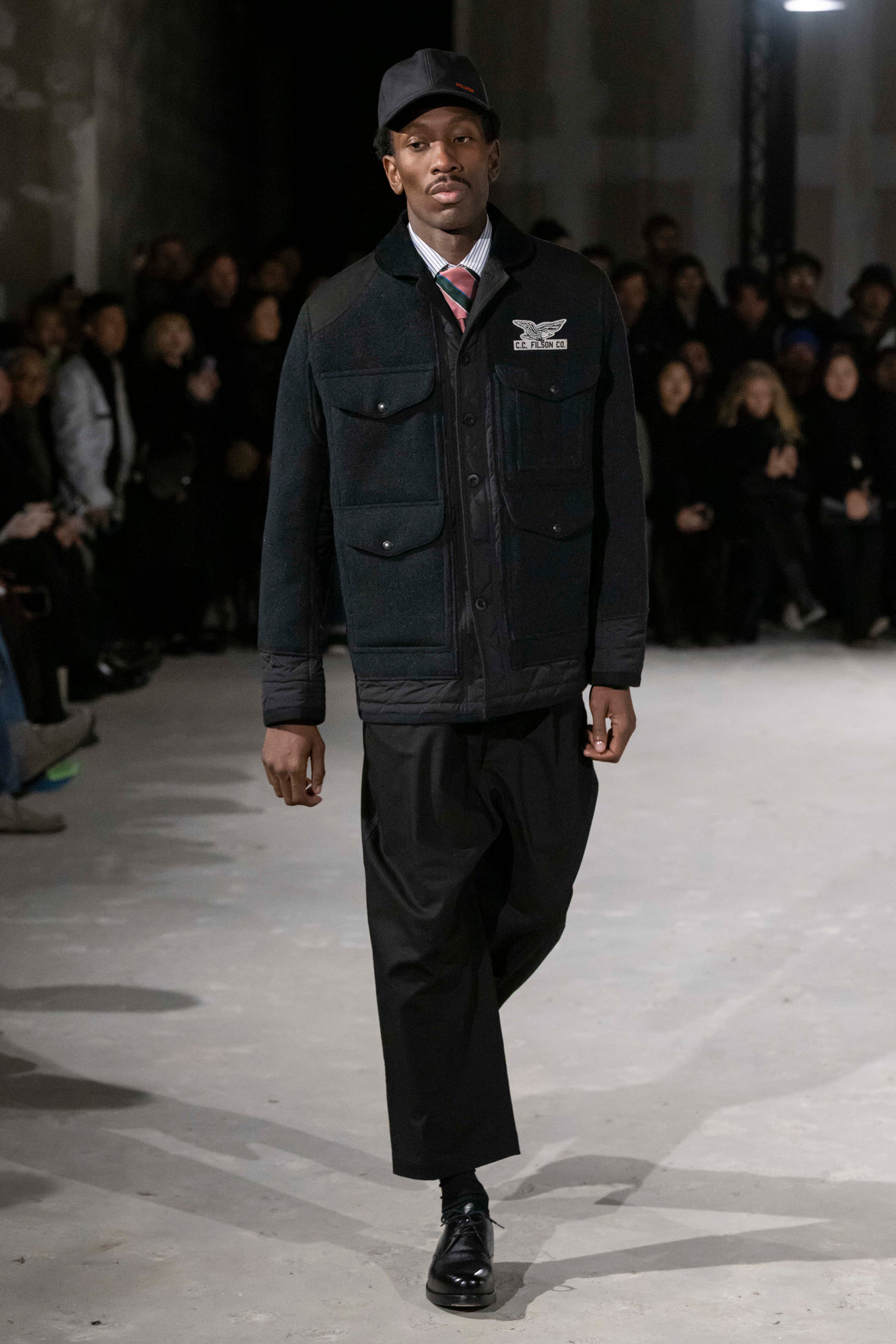 Fashion model wearing a Junya Watanabe Man AW25 outfit