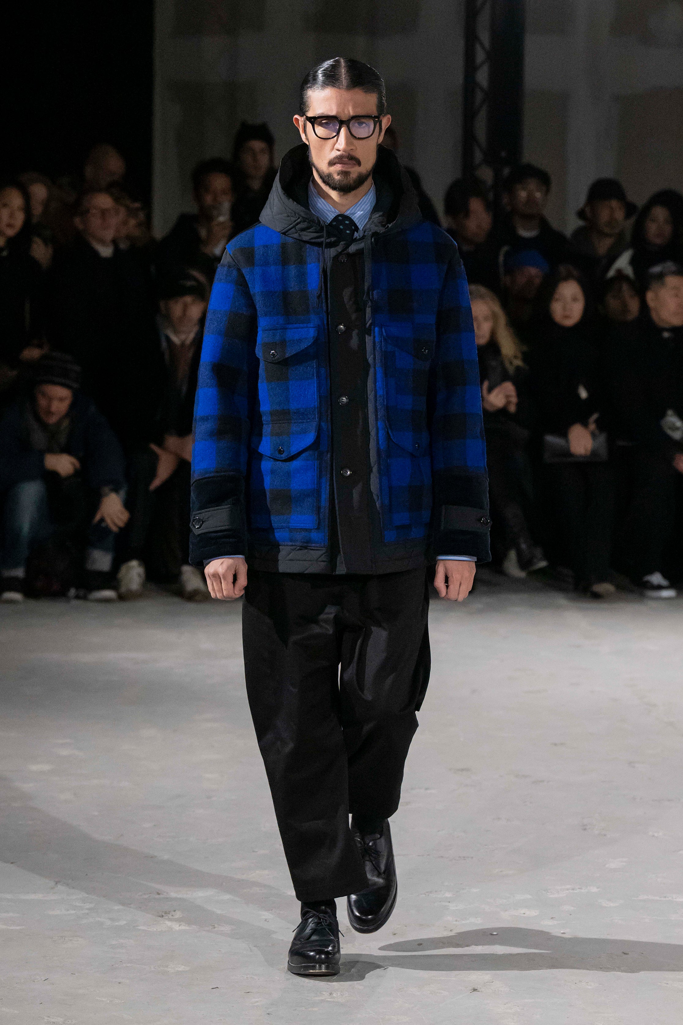 Fashion model wearing a Junya Watanabe Man AW25 outfit
