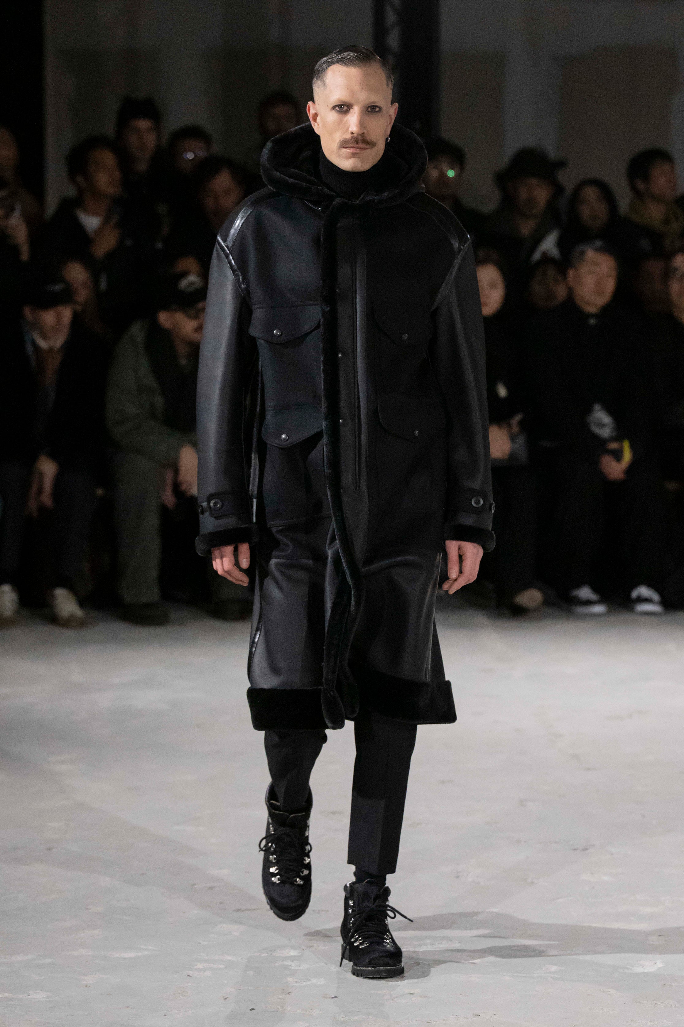 Fashion model wearing a Junya Watanabe Man AW25 outfit