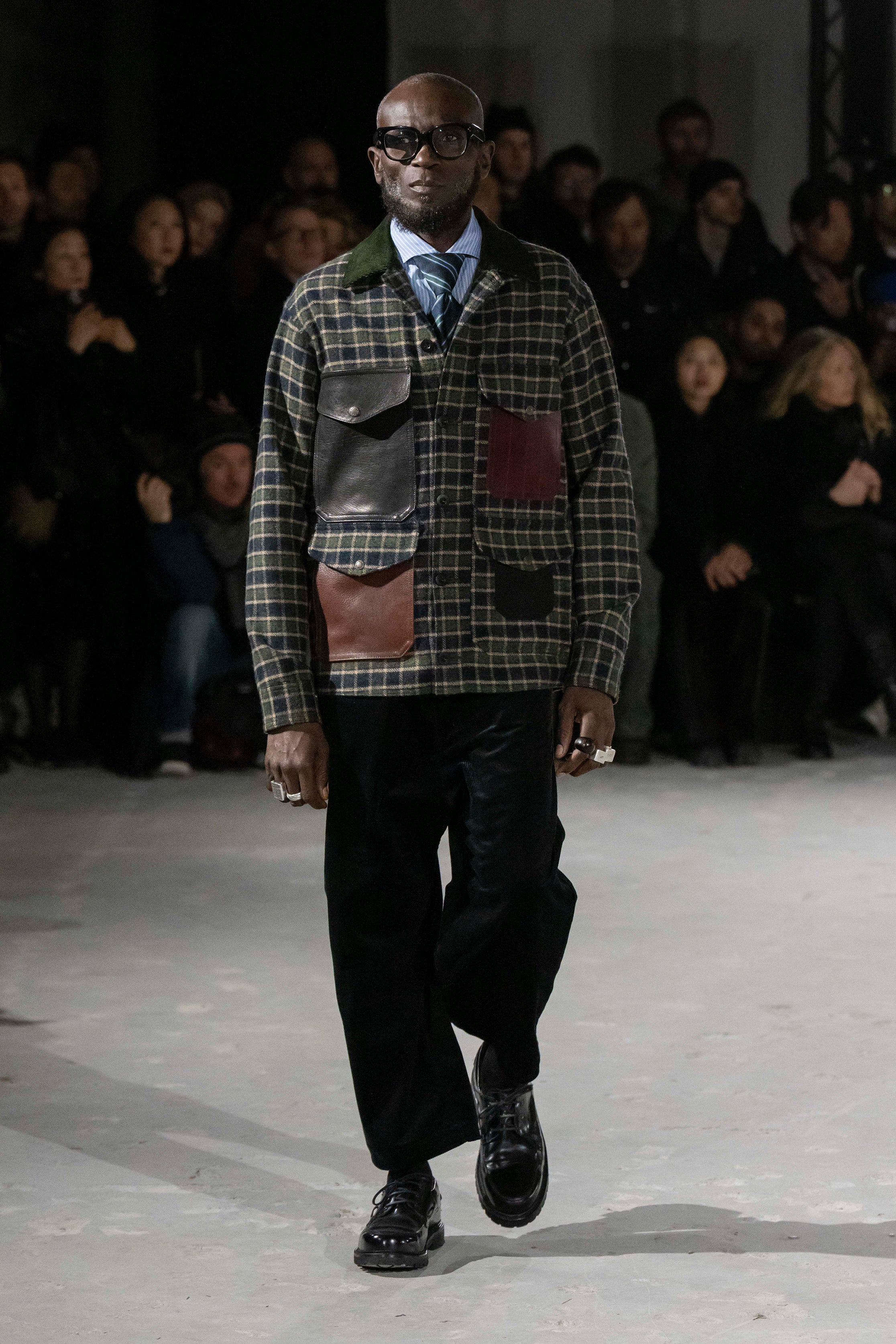 Fashion model wearing a Junya Watanabe Man AW25 outfit