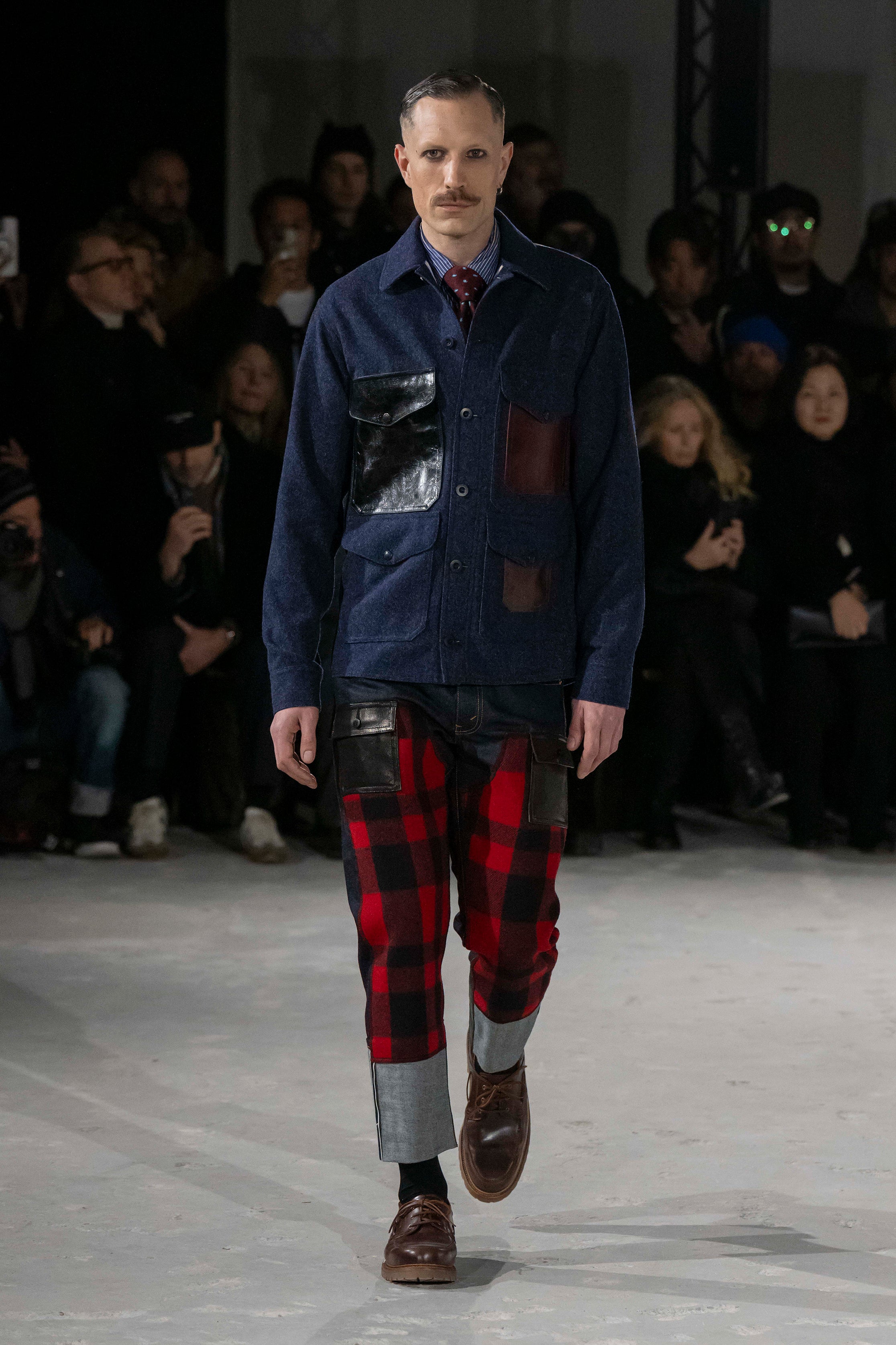 Fashion model wearing a Junya Watanabe Man AW25 outfit