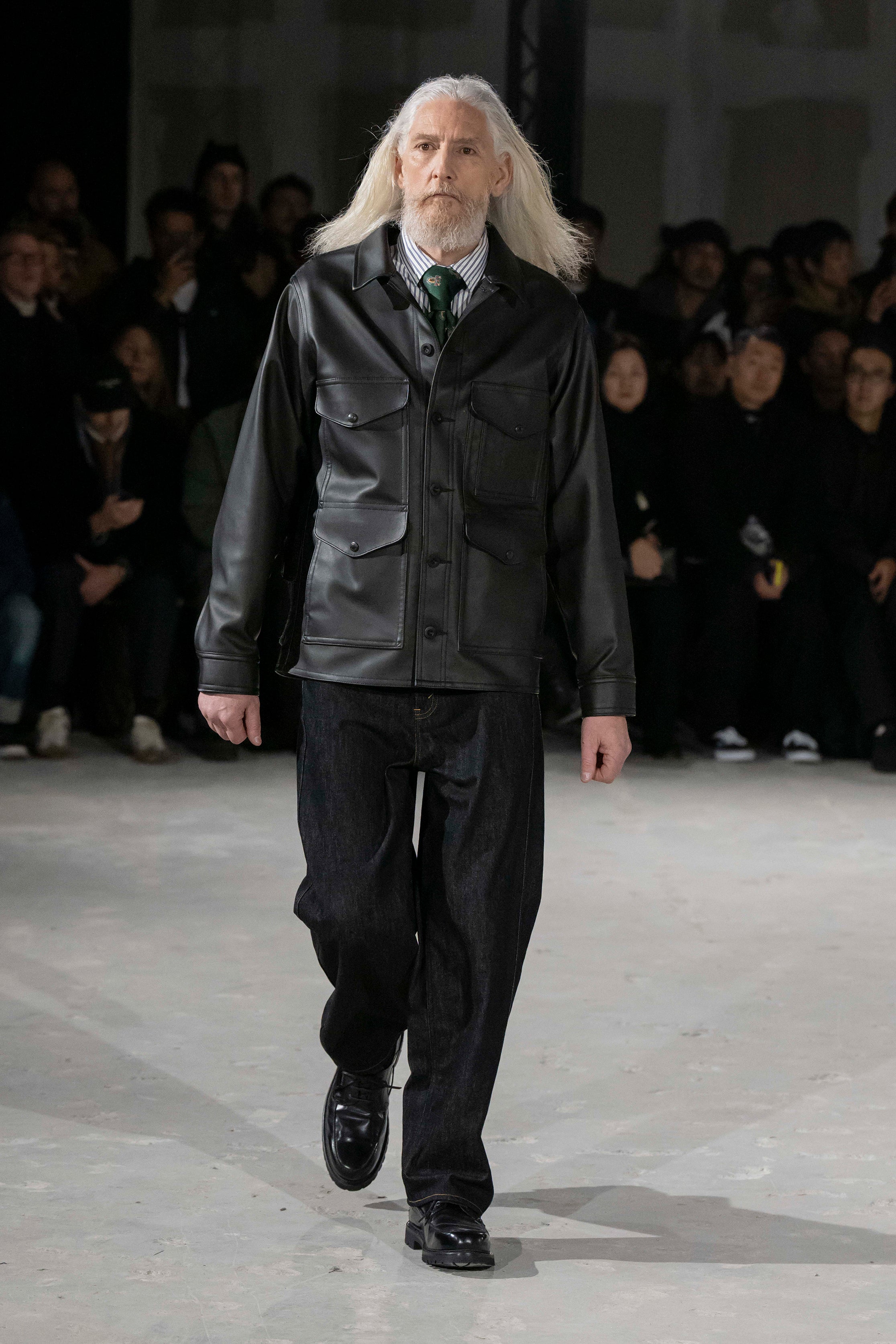 Fashion model wearing a Junya Watanabe Man AW25 outfit
