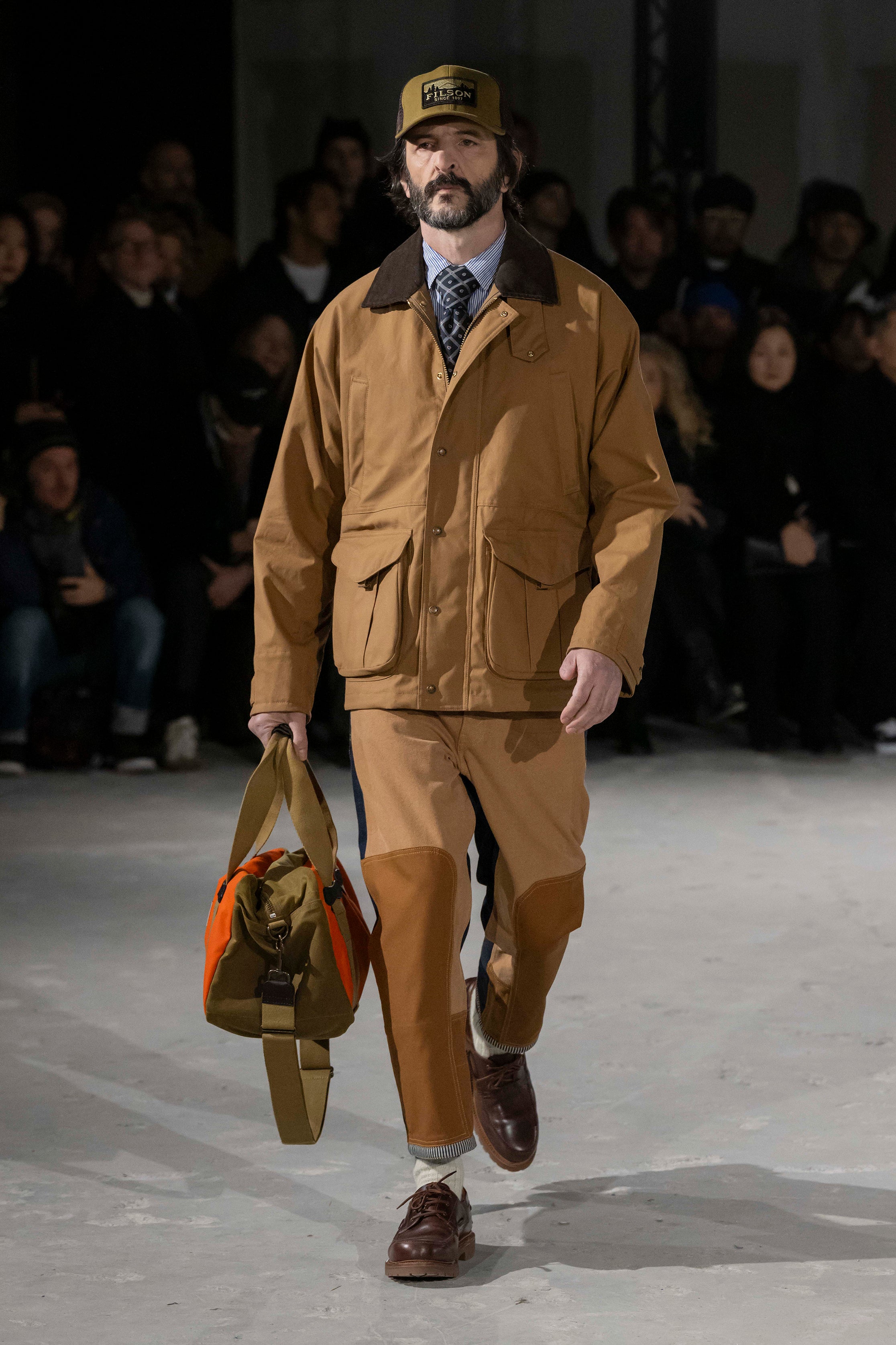 Fashion model wearing a Junya Watanabe Man AW25 outfit