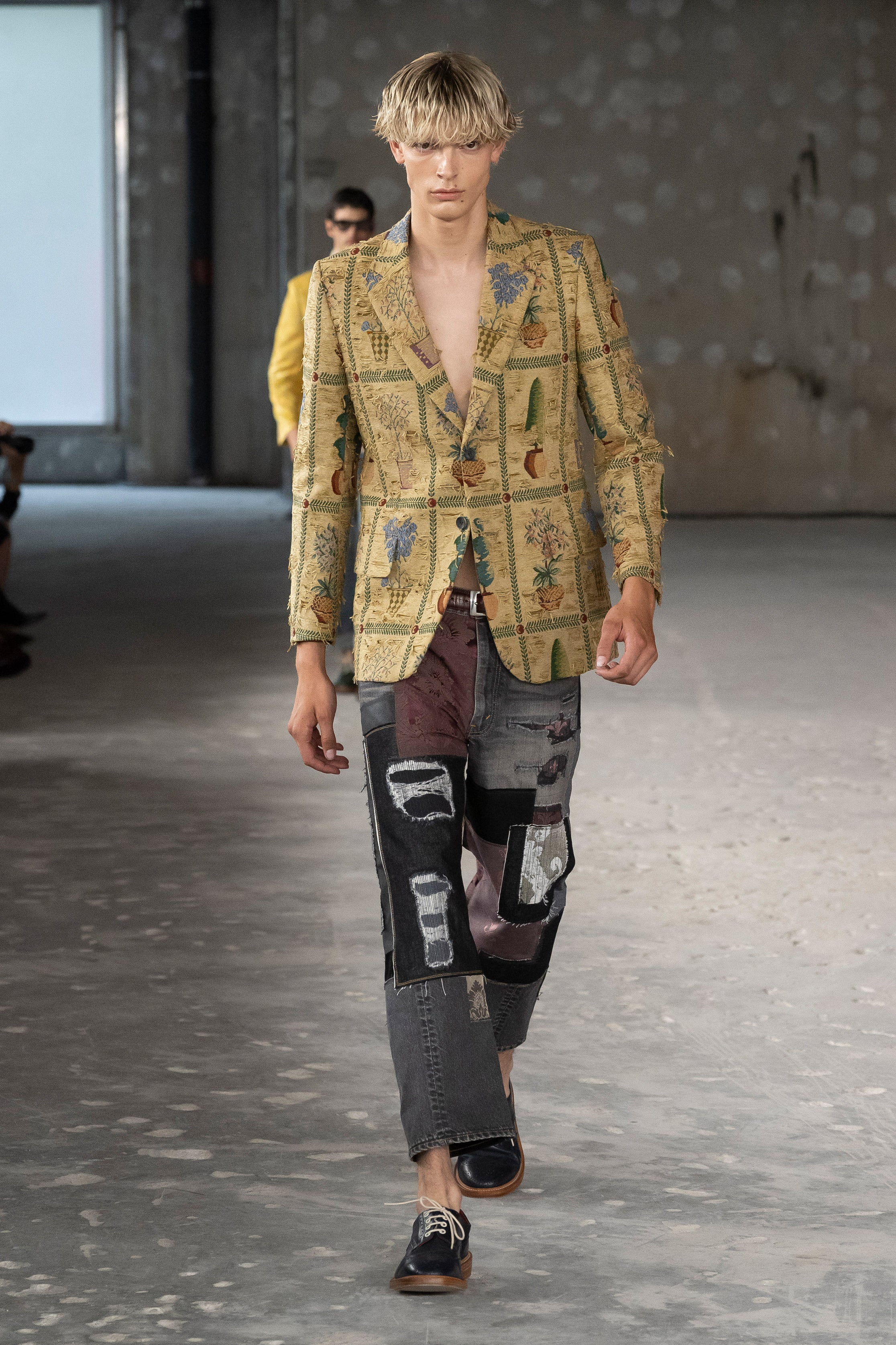 Fashion model wearing a Junya Watanabe Man SS26 outfit