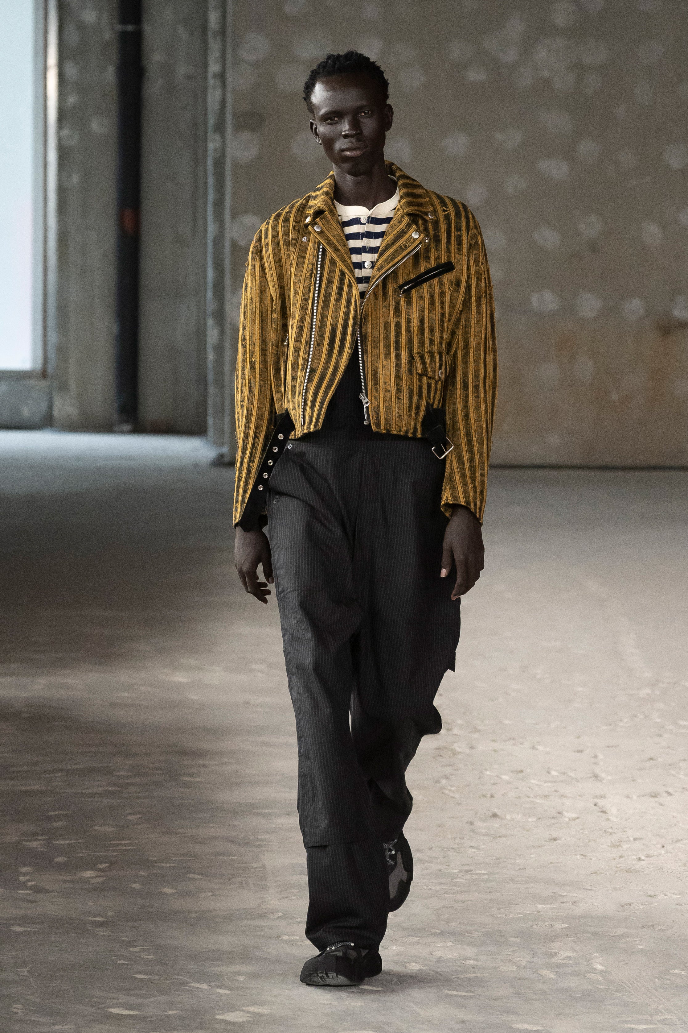 Fashion model wearing a Junya Watanabe Man SS26 outfit