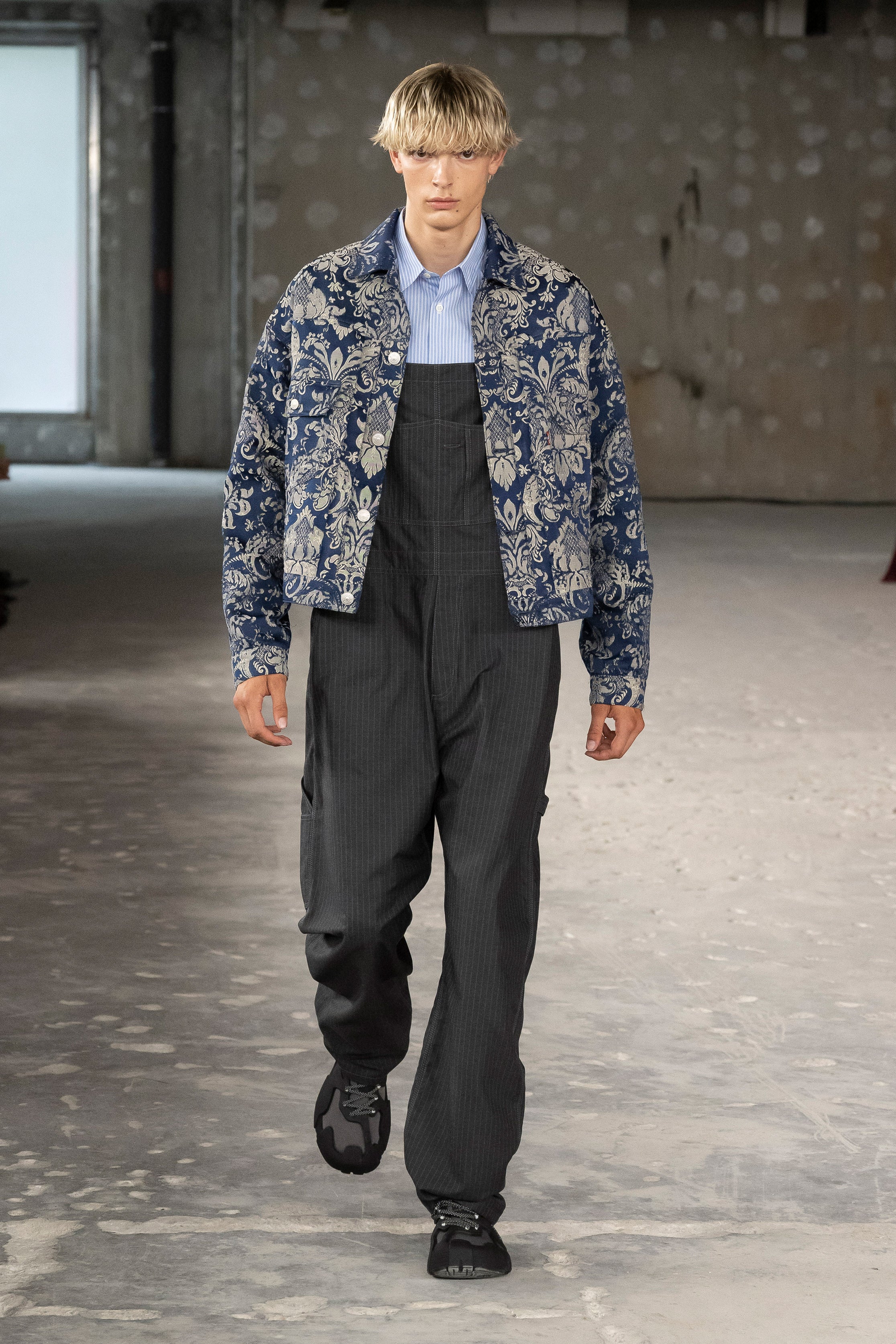 Fashion model wearing a Junya Watanabe Man SS26 outfit
