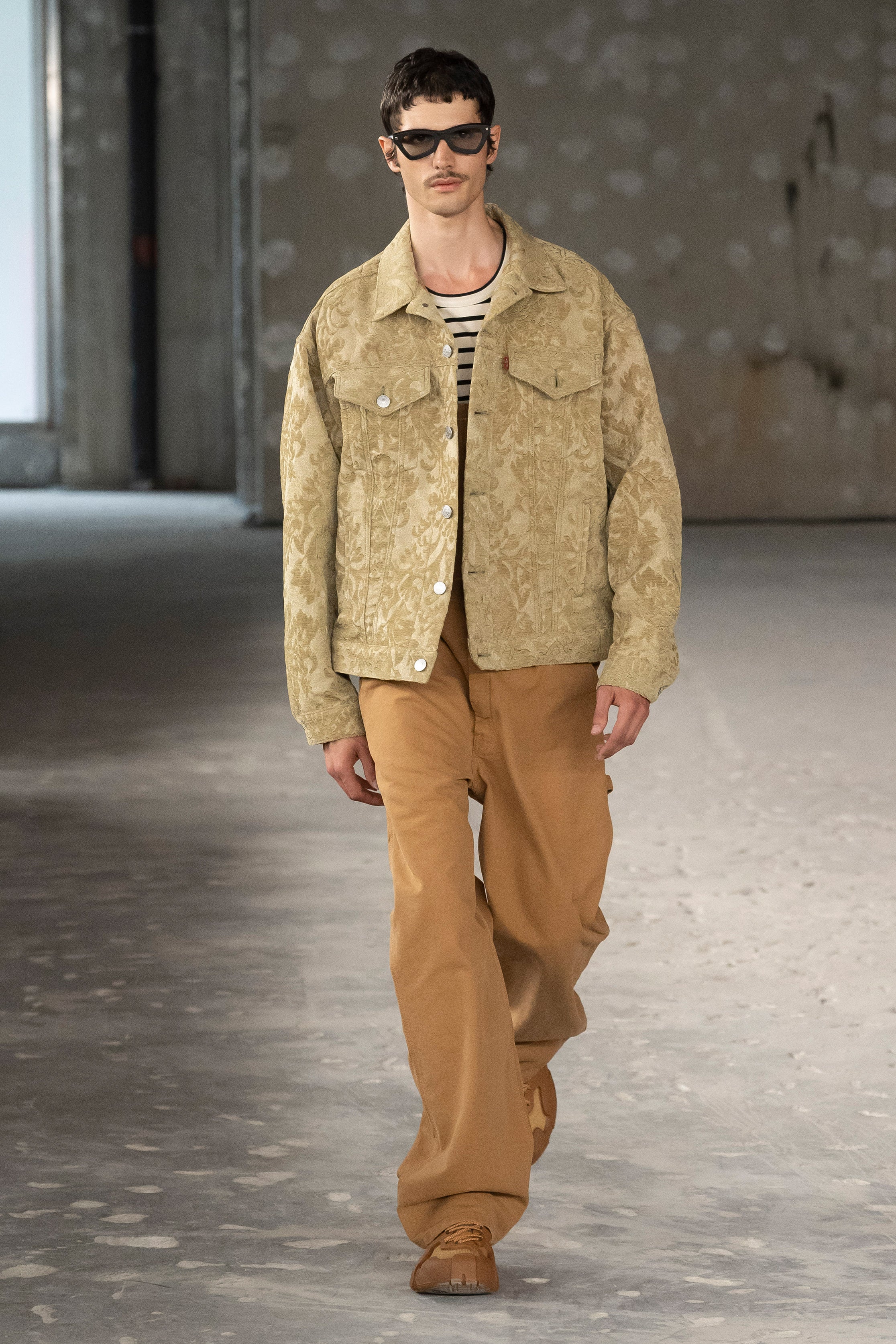 Fashion model wearing a Junya Watanabe Man SS26 outfit