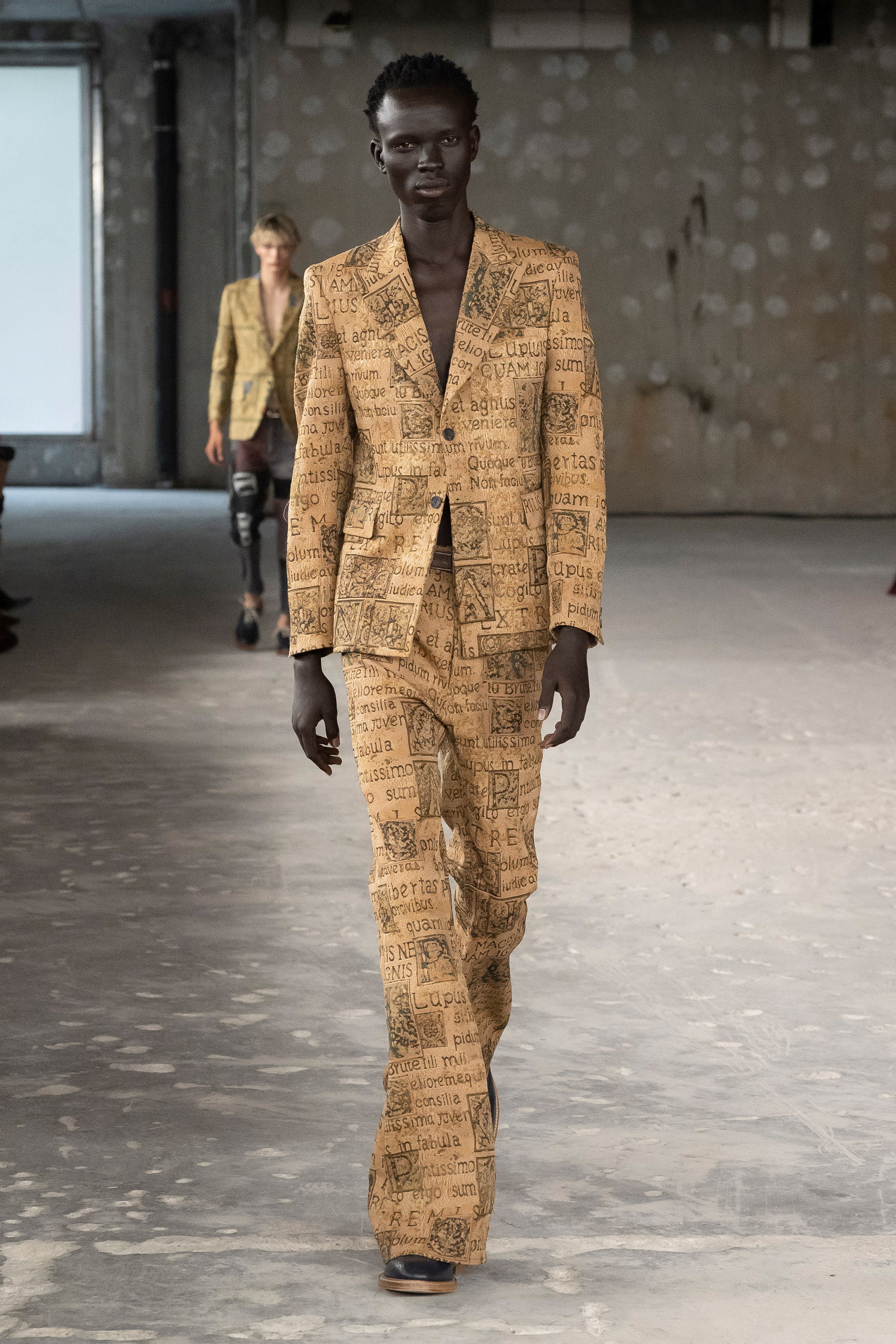 Fashion model wearing a Junya Watanabe Man SS26 outfit