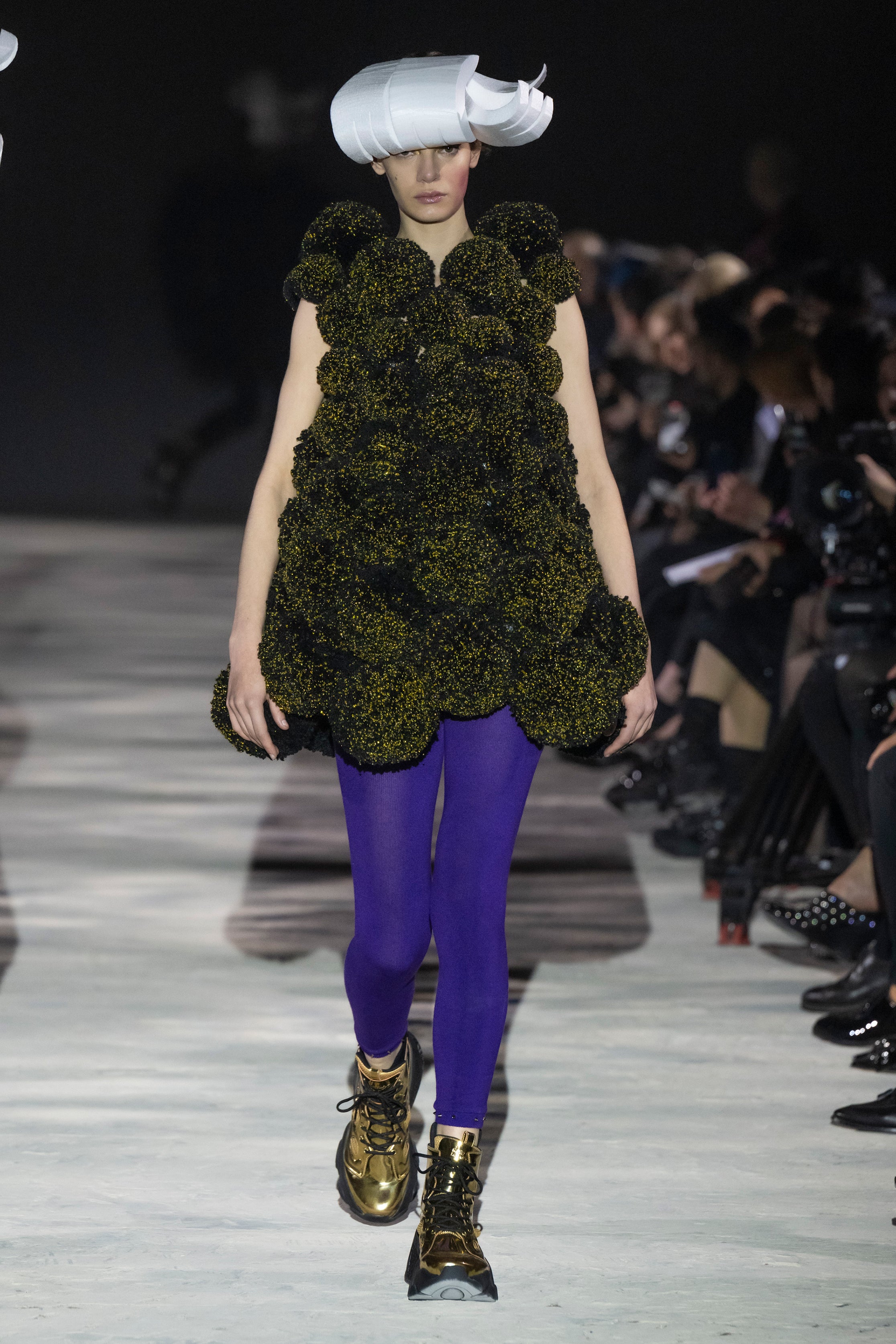 Fashion model wearing a noir kei ninomiya AW25 outfit
