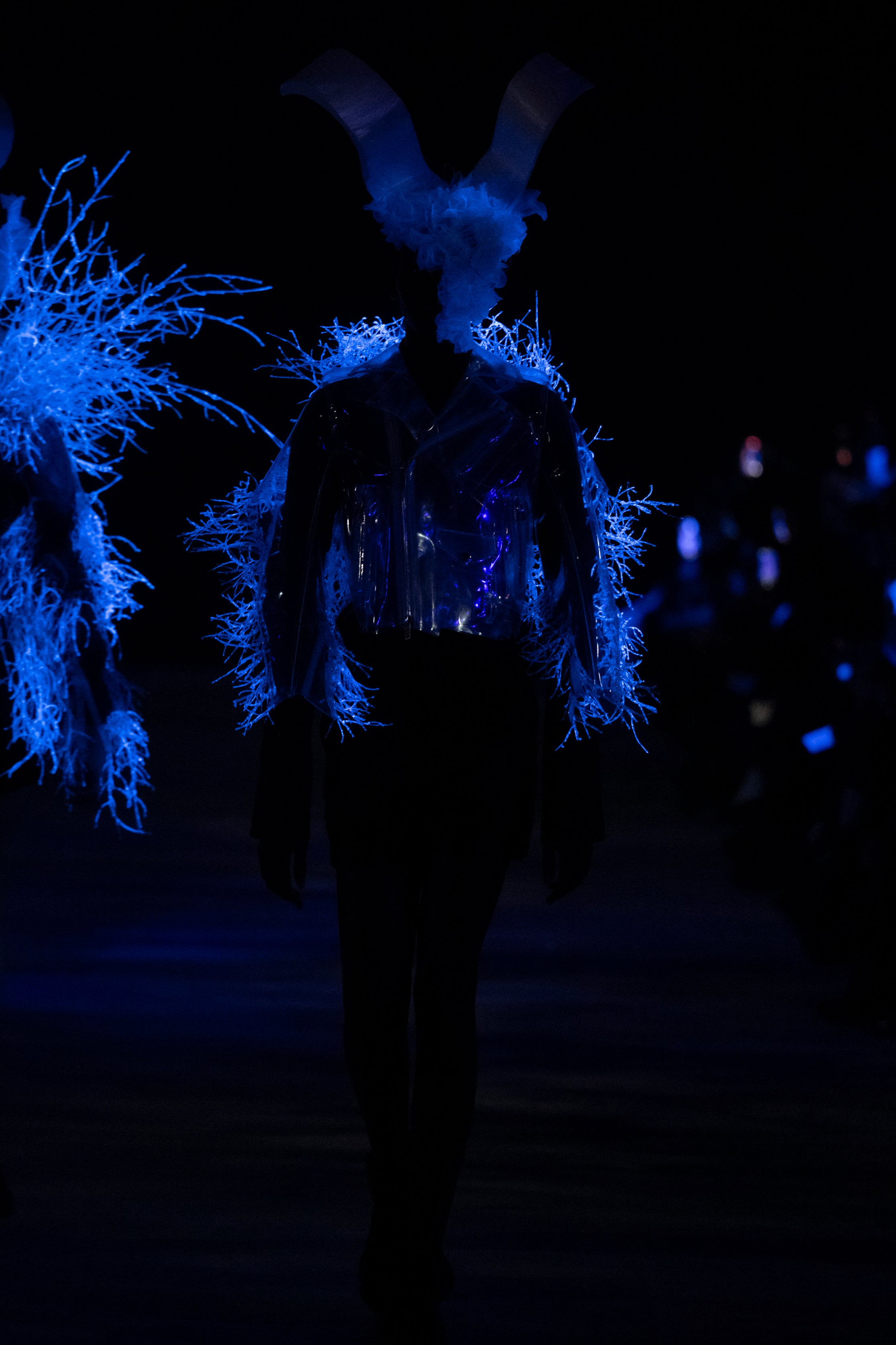 Fashion model wearing a noir kei ninomiya AW25 outfit