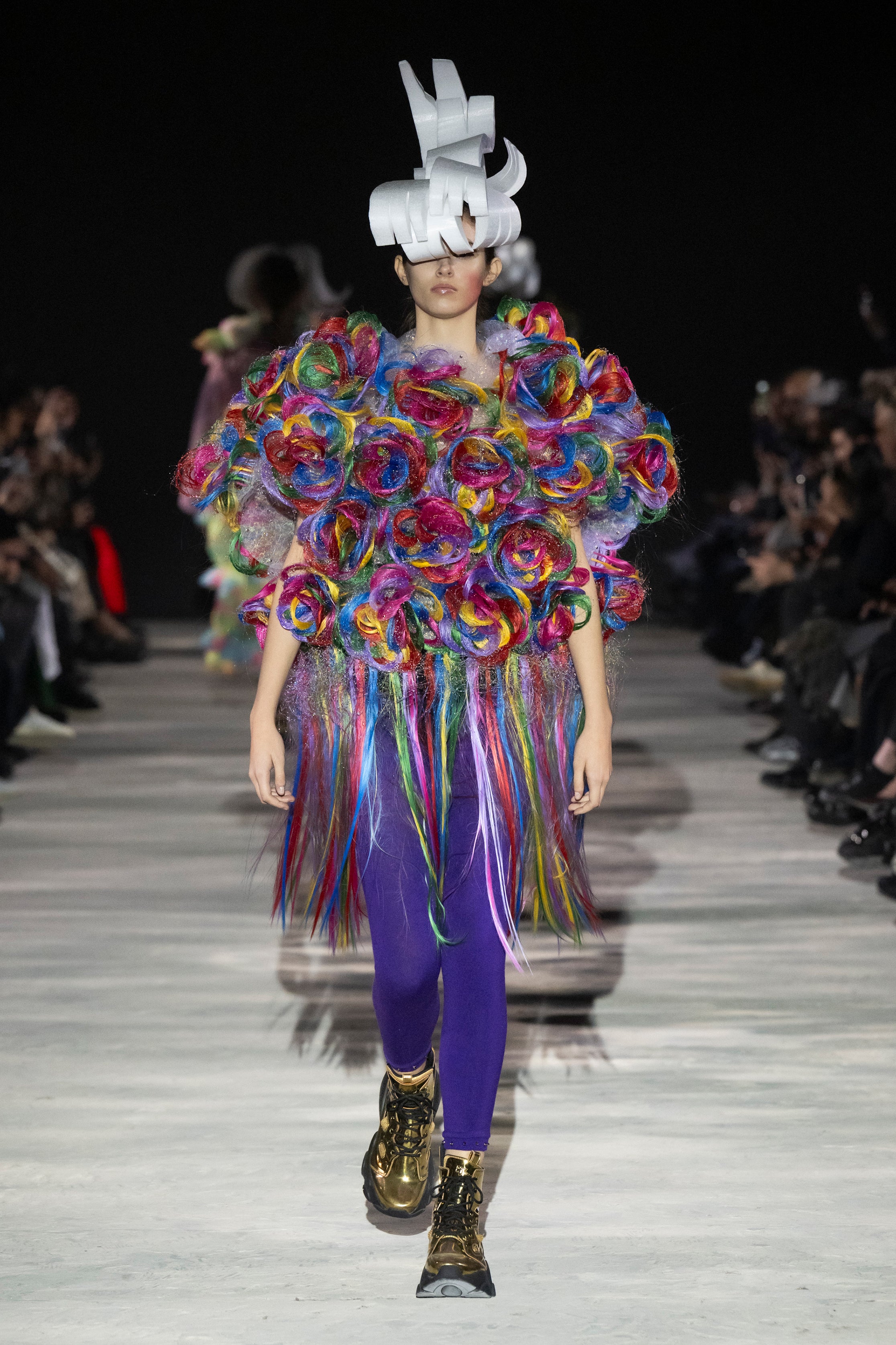 Fashion model wearing a noir kei ninomiya AW25 outfit