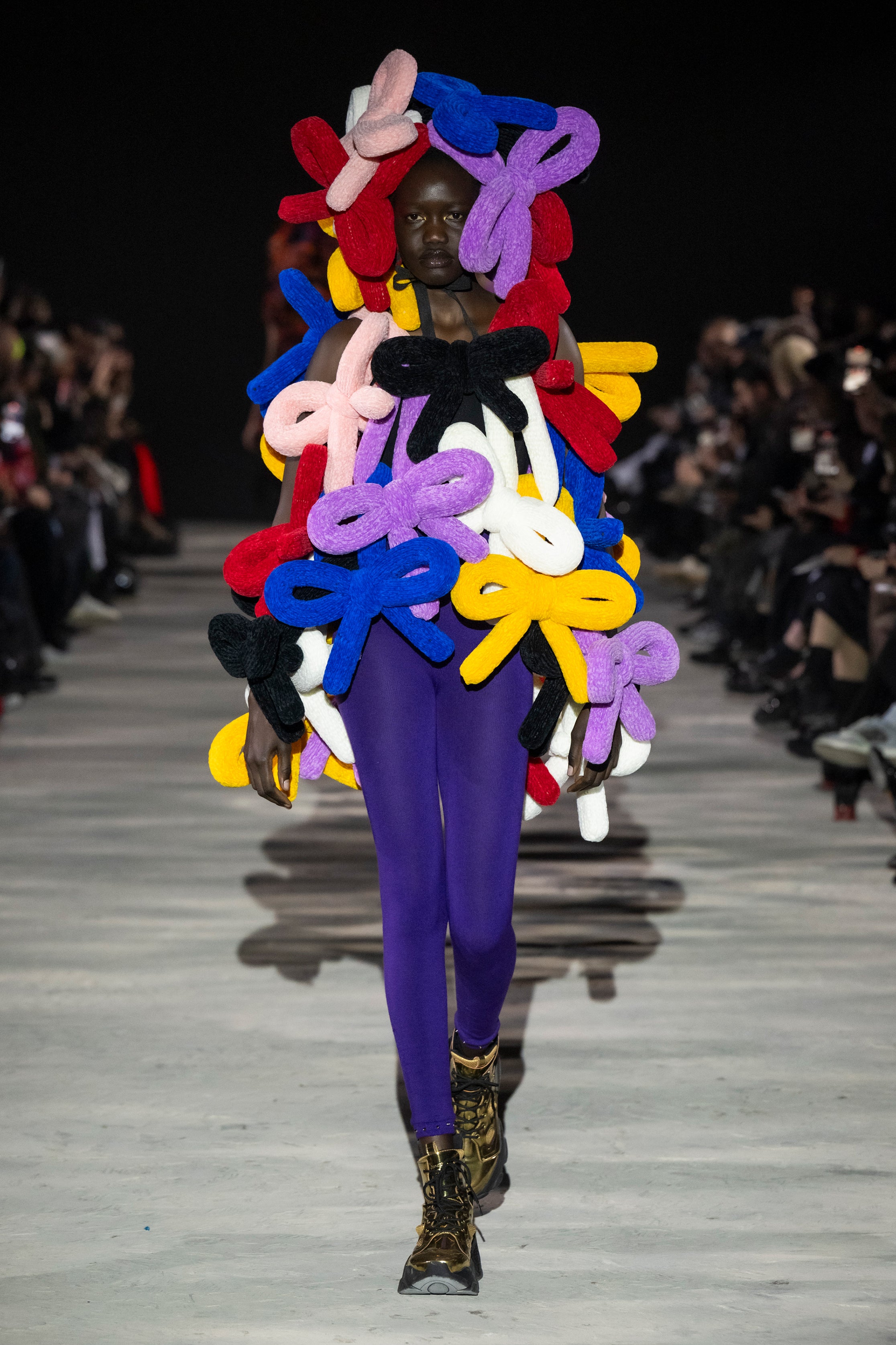Fashion model wearing a noir kei ninomiya AW25 outfit