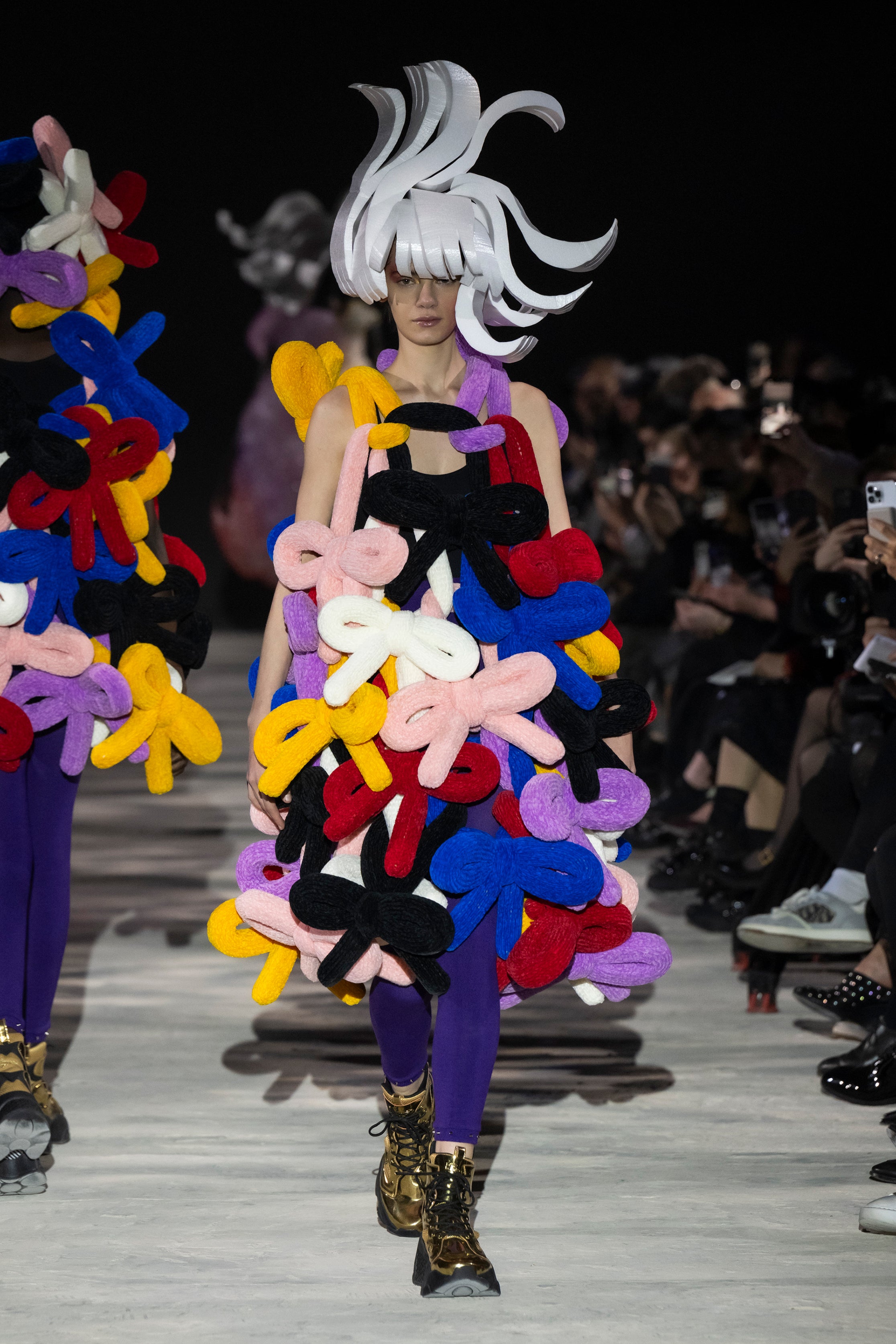 Fashion model wearing a noir kei ninomiya AW25 outfit