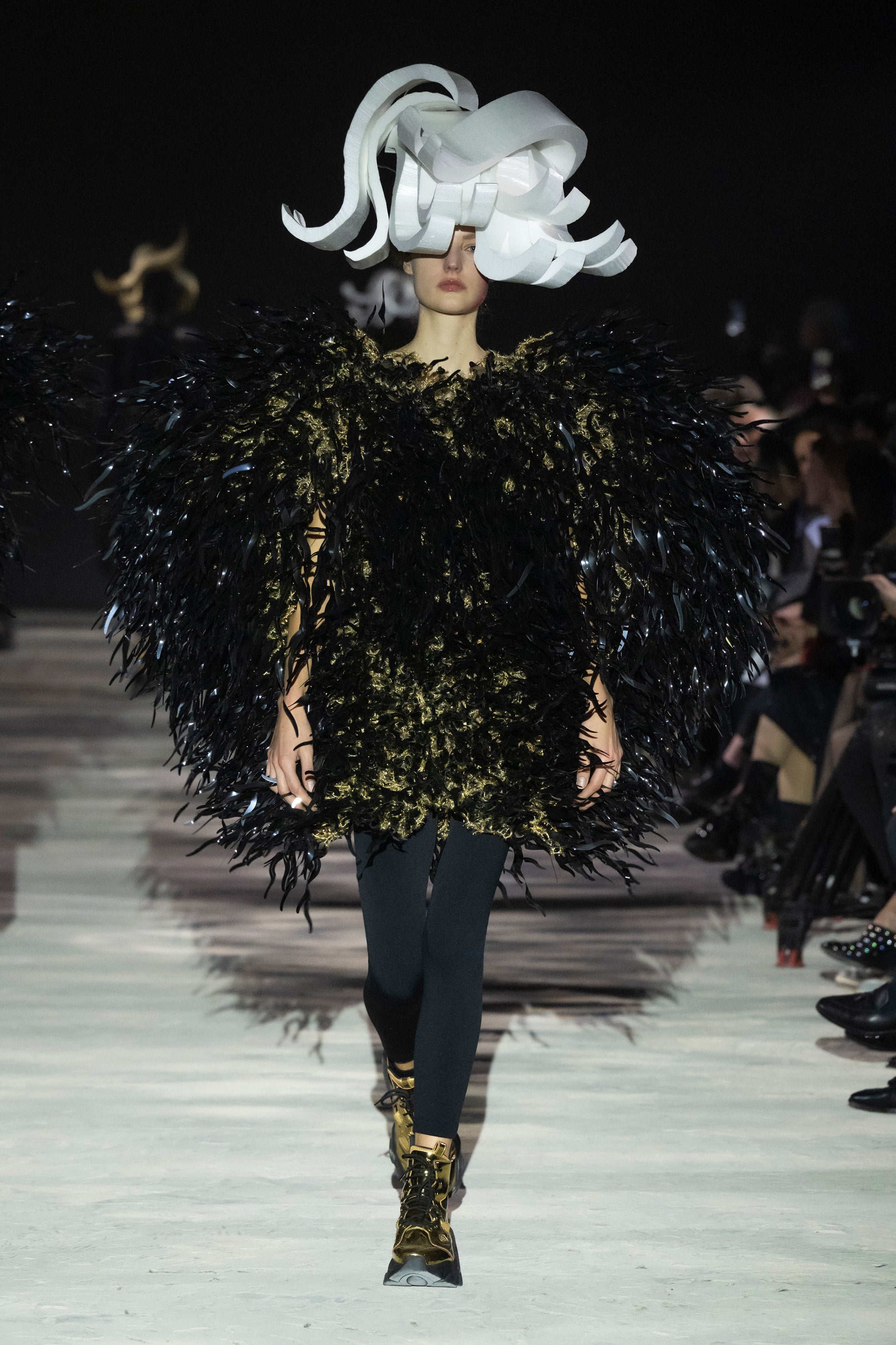 Fashion model wearing a noir kei ninomiya AW25 outfit