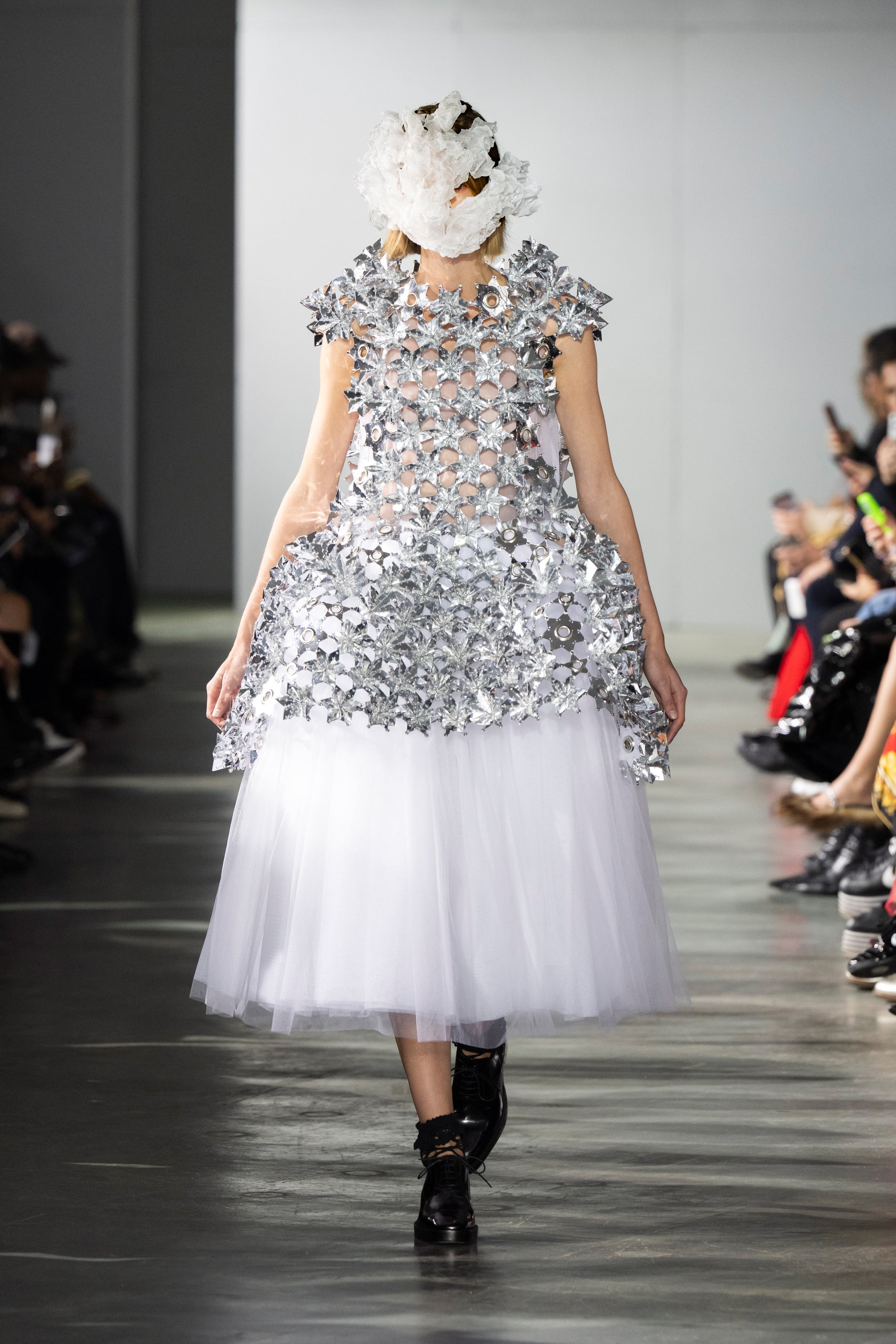 Fashion model wearing a Noir Kei Ninomiya SS26 outfit