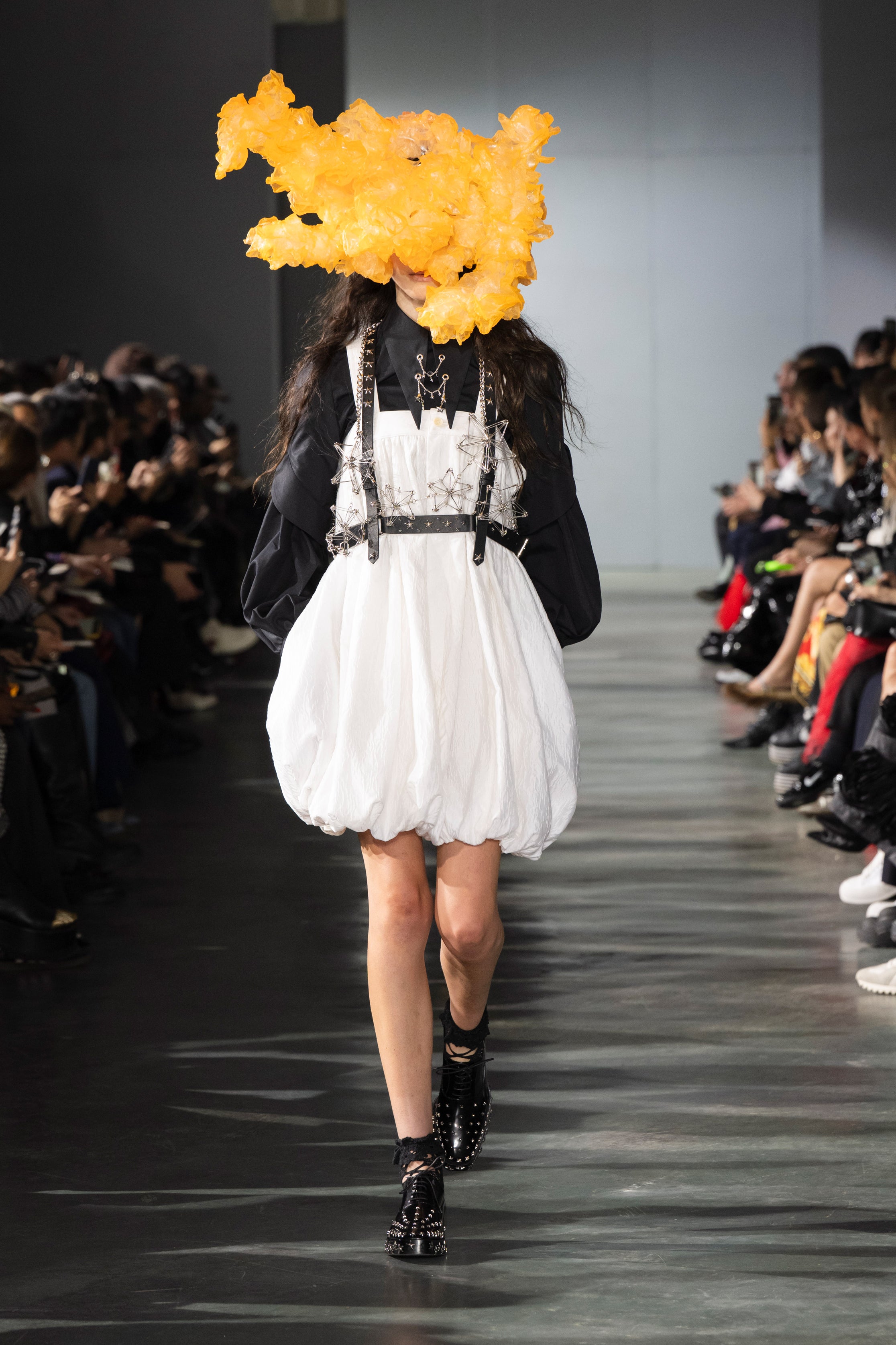 Fashion model wearing a Noir Kei Ninomiya SS26 outfit