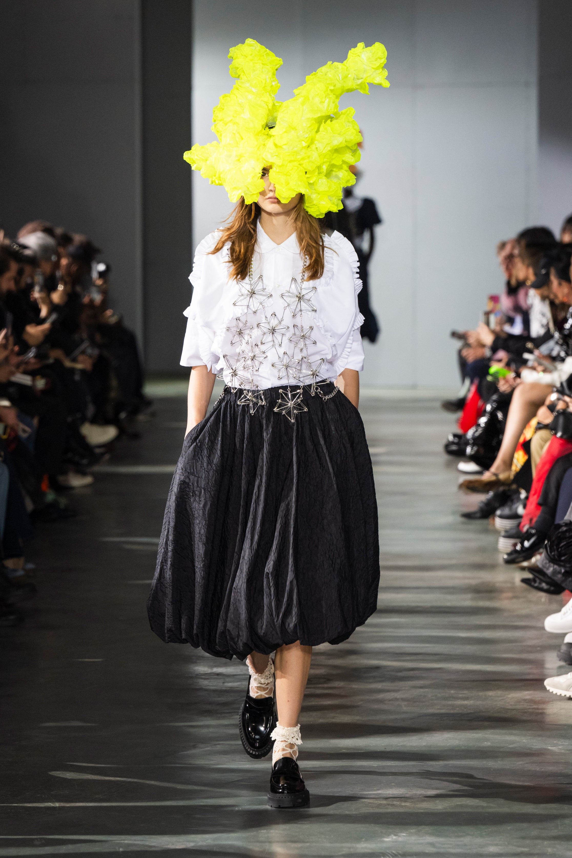 Fashion model wearing a Noir Kei Ninomiya SS26 outfit