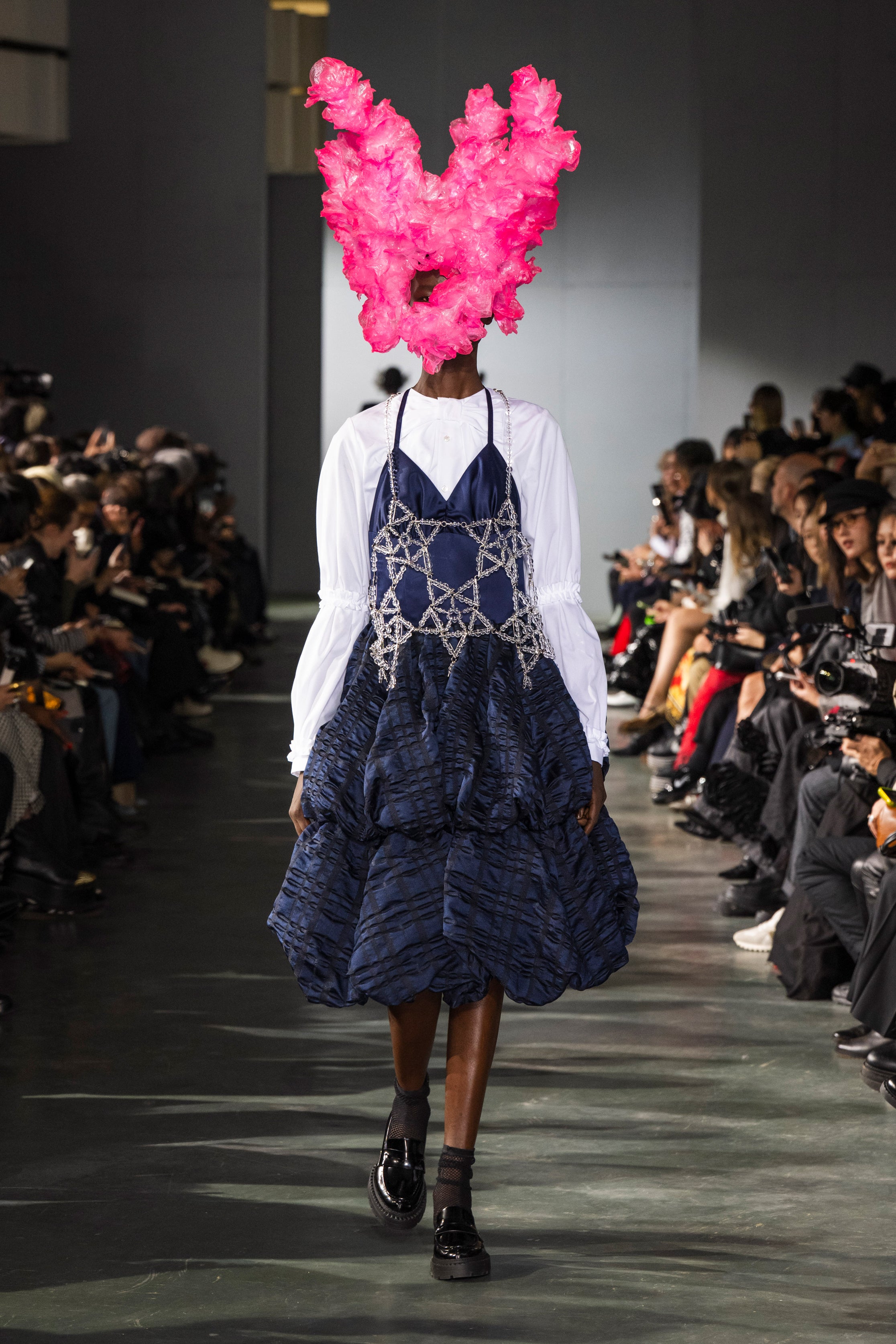 Fashion model wearing a Noir Kei Ninomiya SS26 outfit