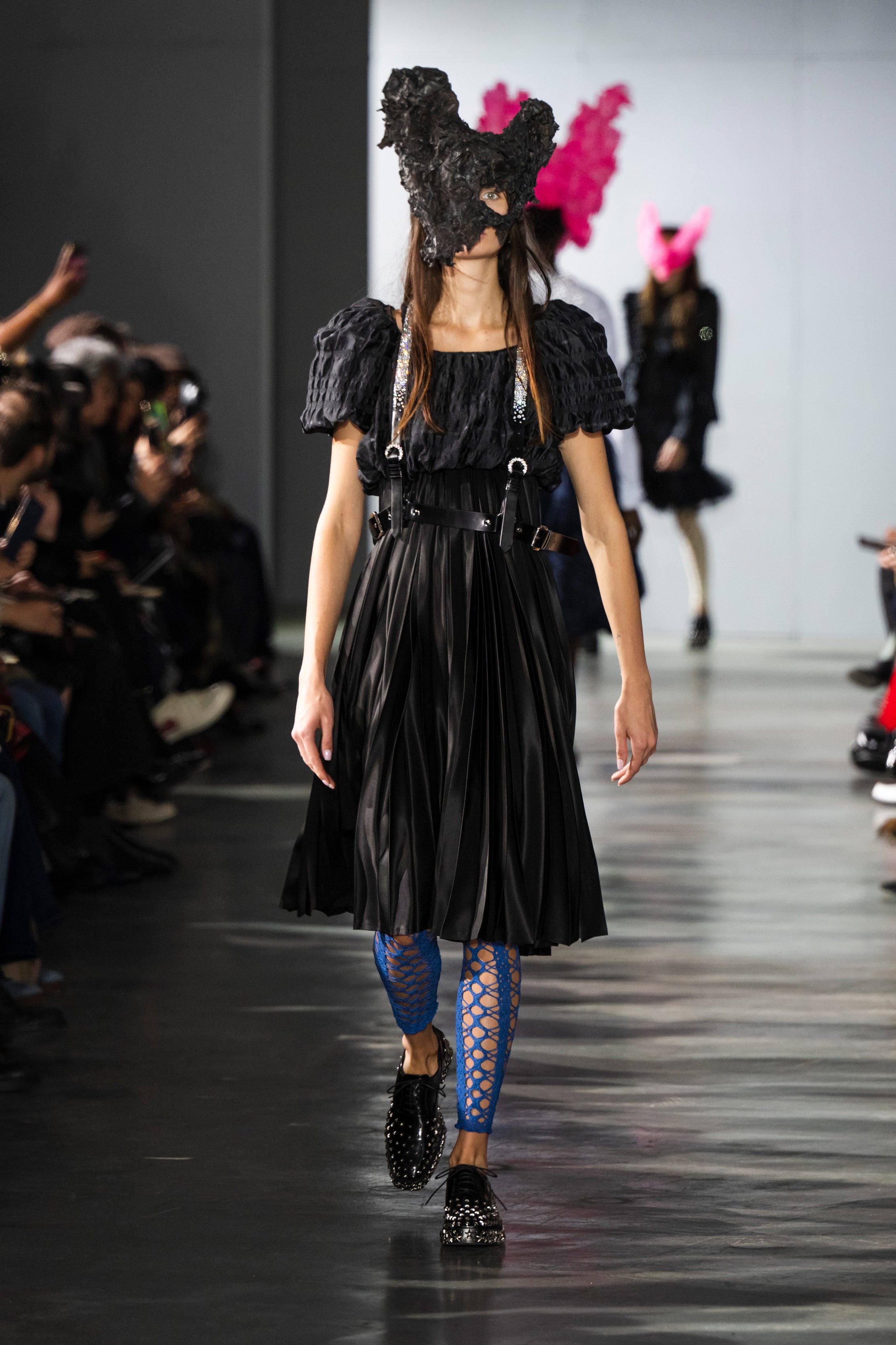 Fashion model wearing a Noir Kei Ninomiya SS26 outfit