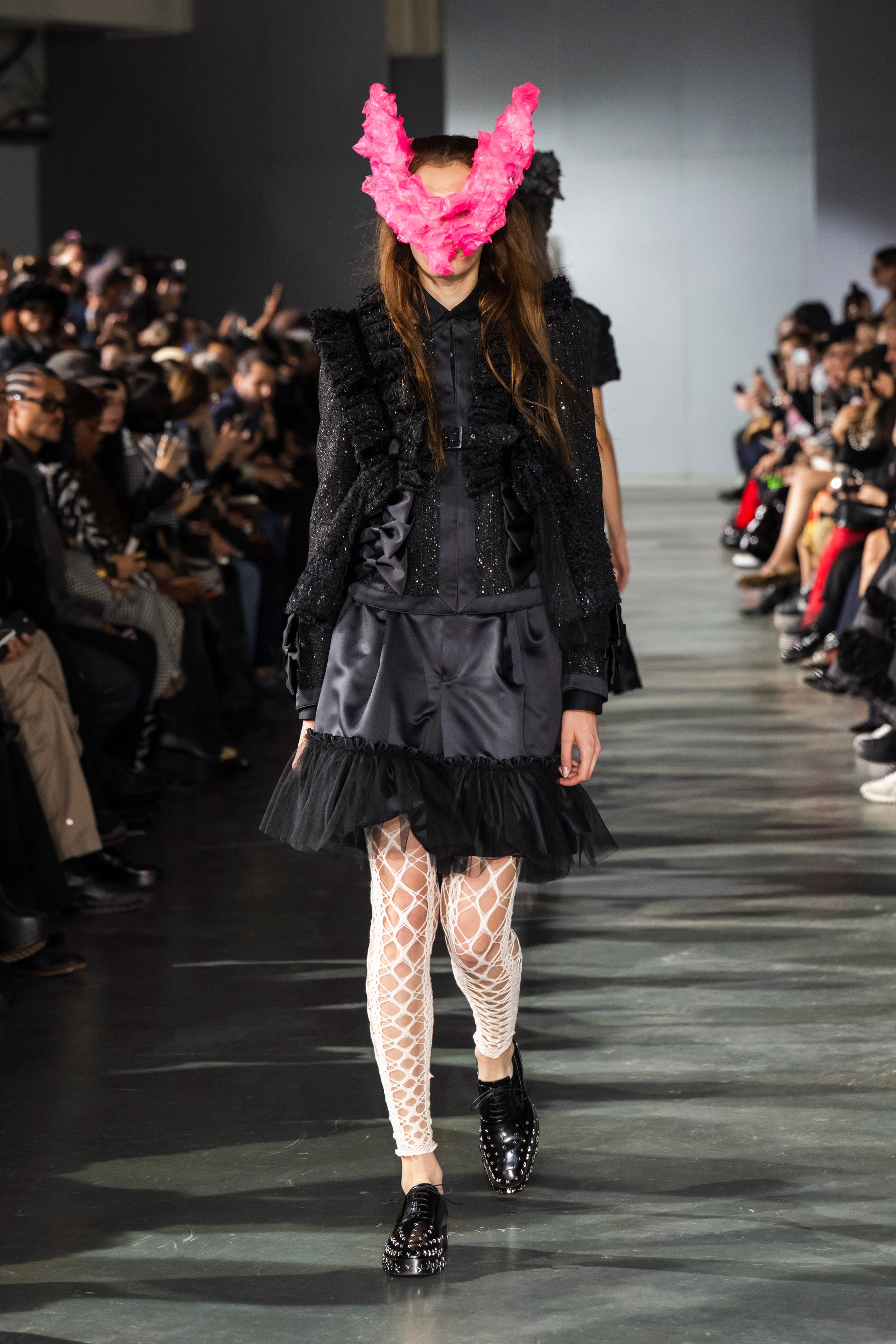 Fashion model wearing a Noir Kei Ninomiya SS26 outfit