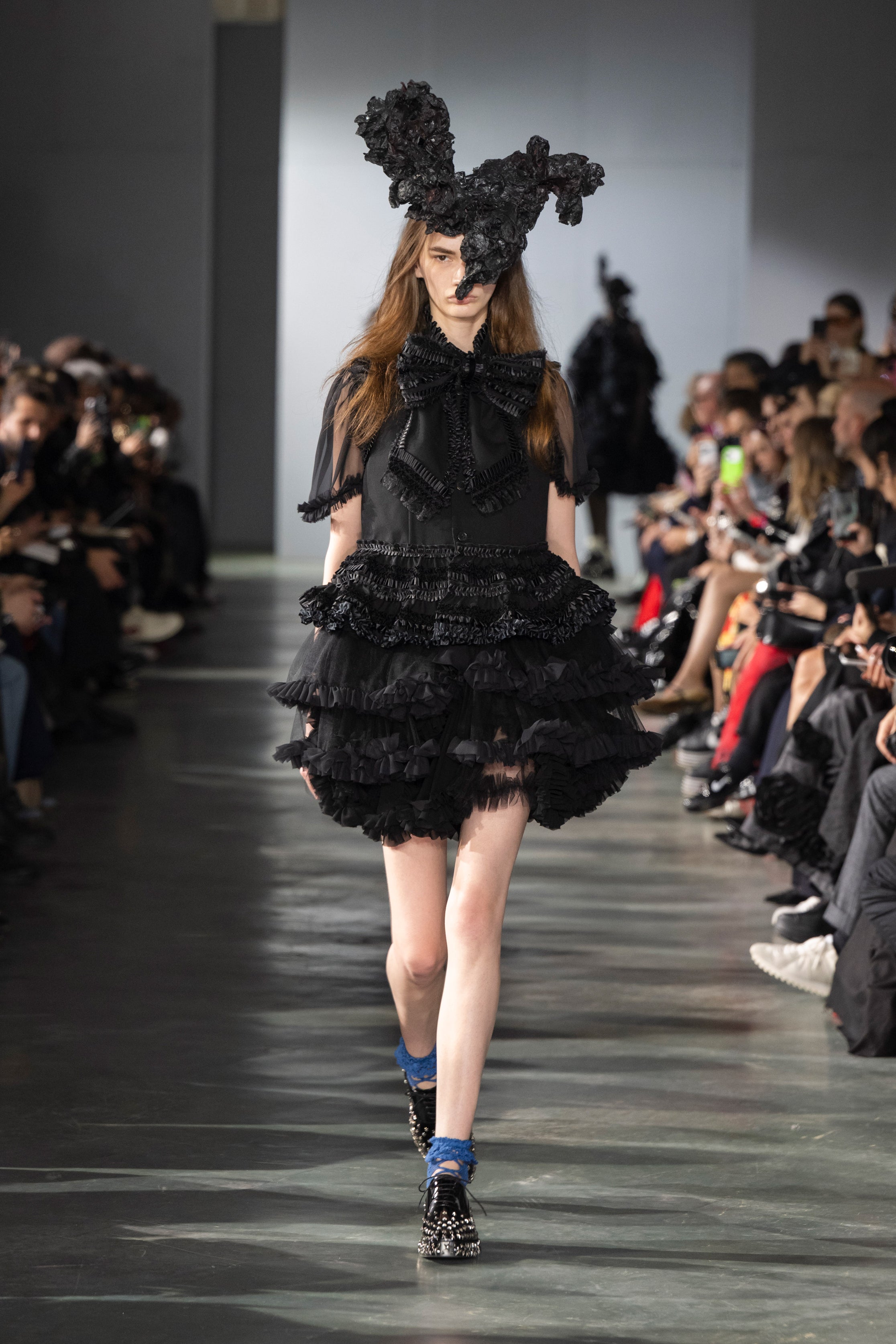 Fashion model wearing a Noir Kei Ninomiya SS26 outfit