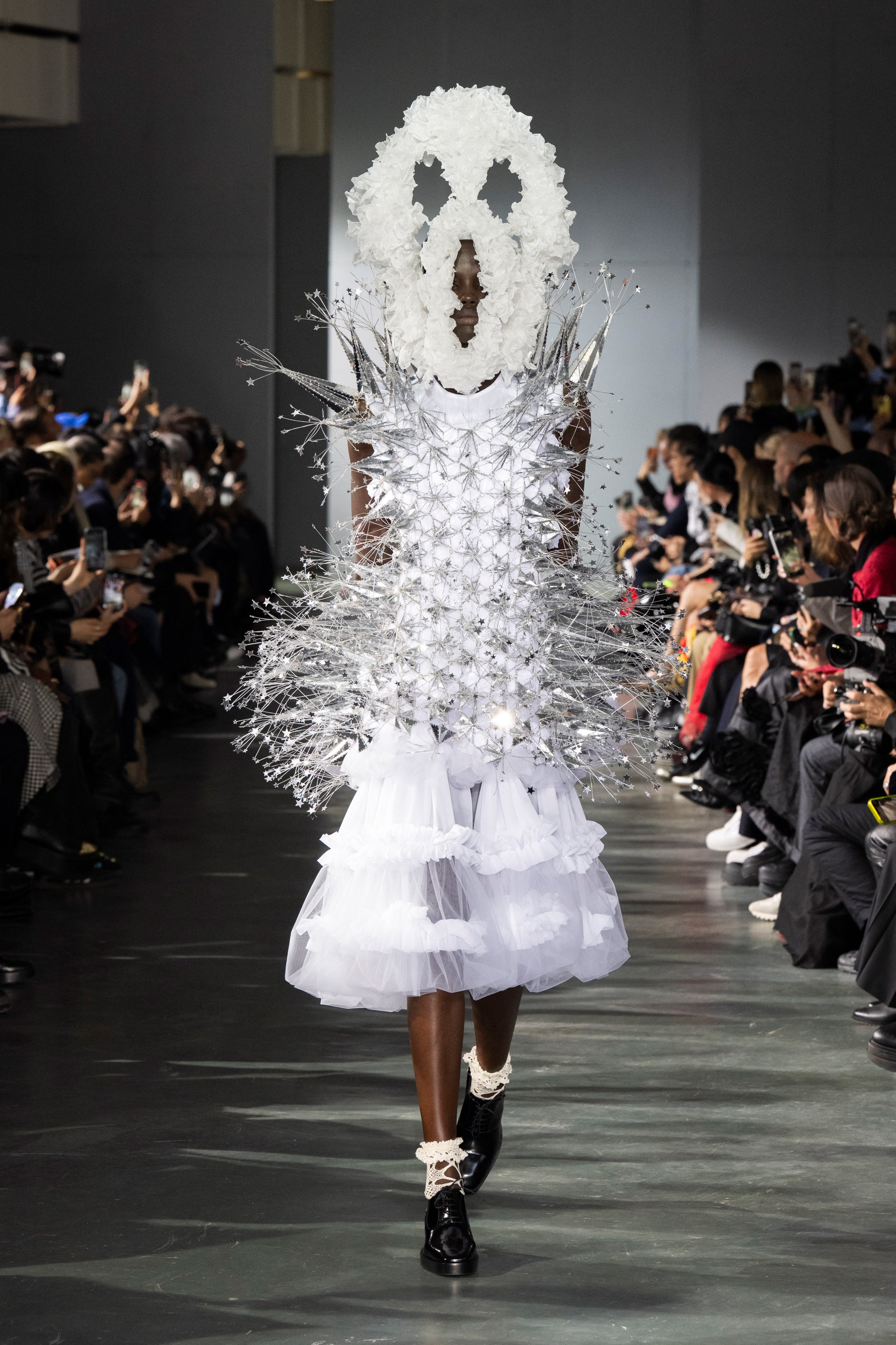 Fashion model wearing a Noir Kei Ninomiya SS26 outfit