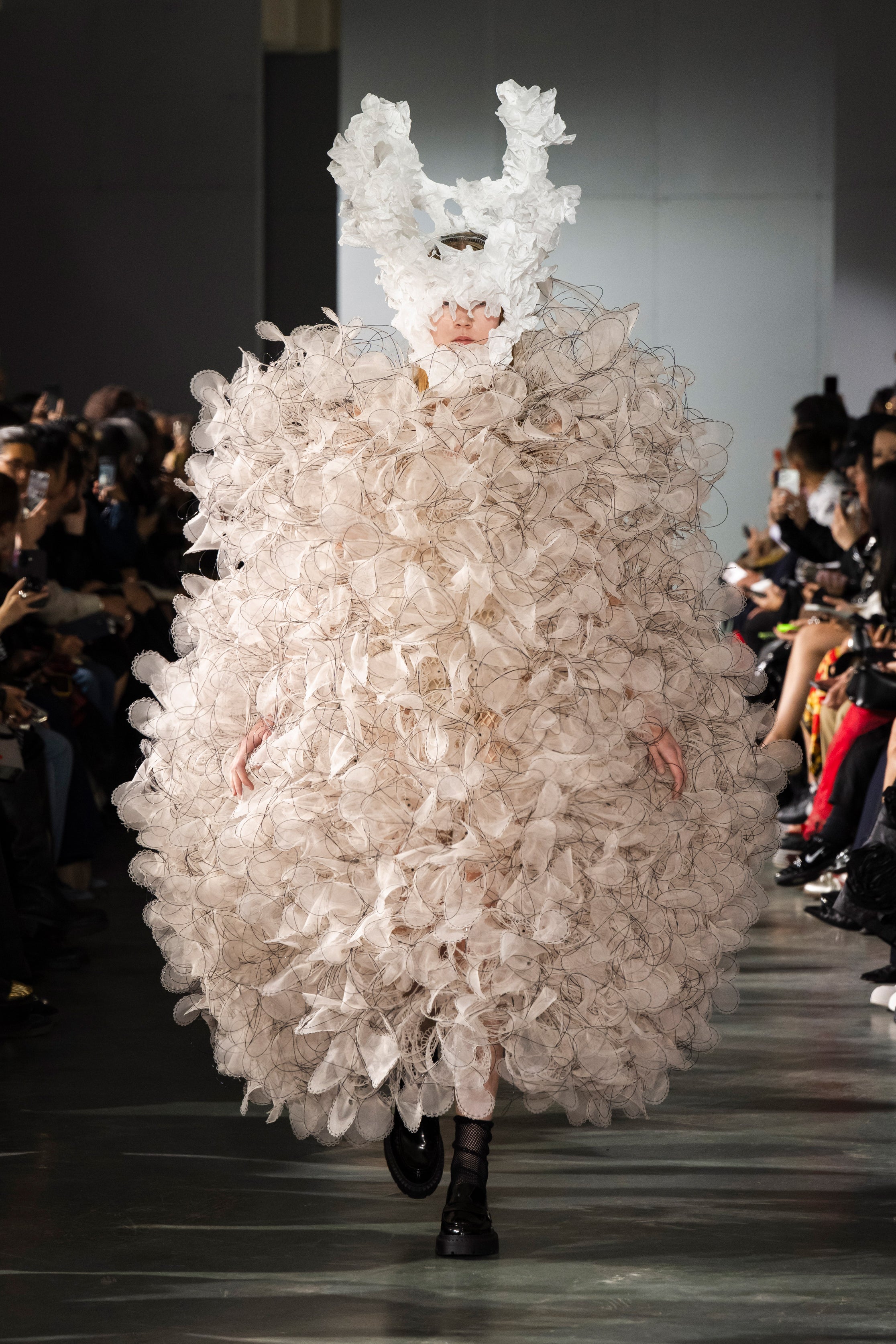 Fashion model wearing a Noir Kei Ninomiya SS26 outfit