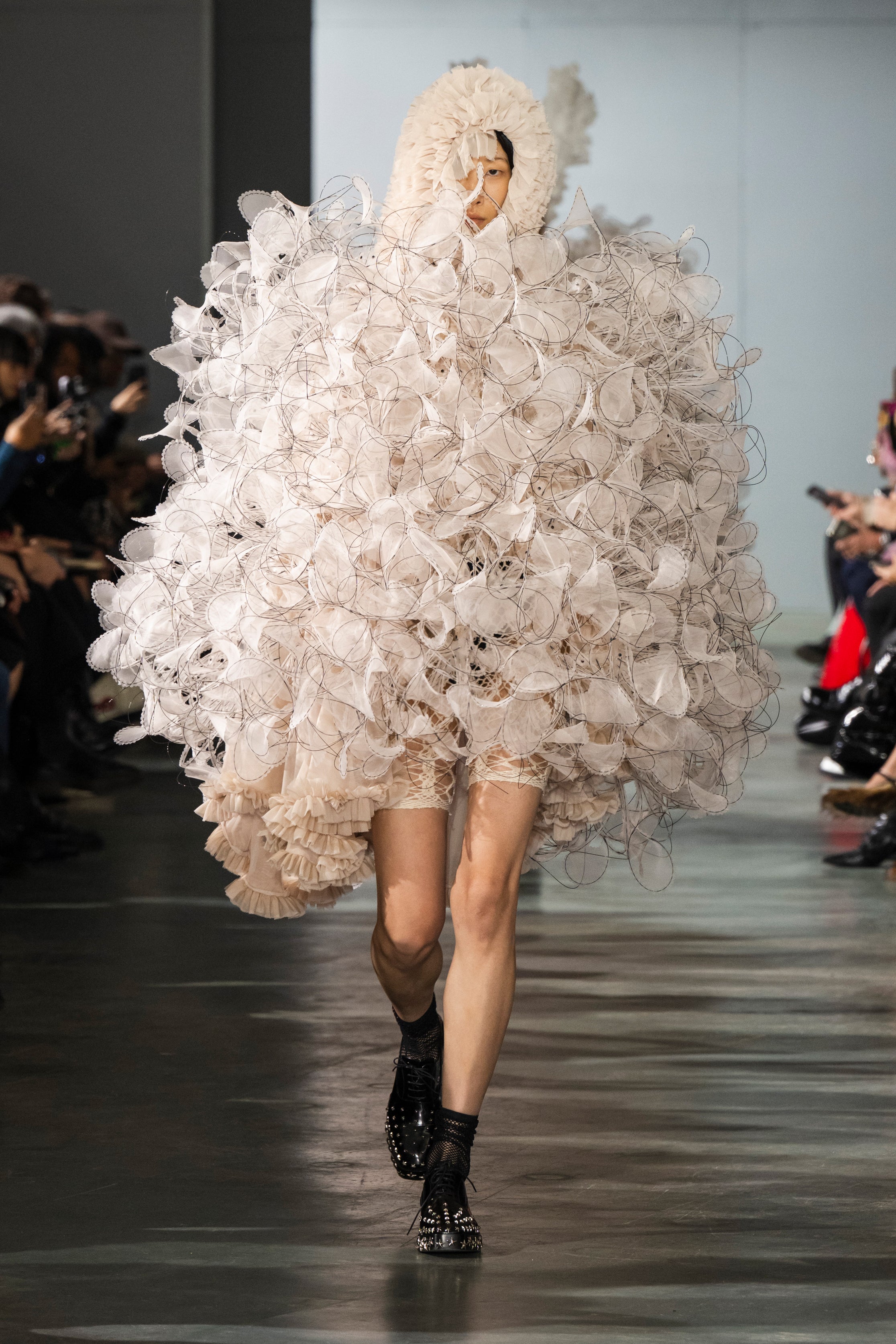 Fashion model wearing a Noir Kei Ninomiya SS26 outfit